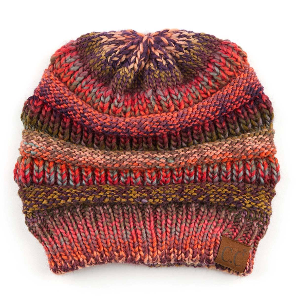 CC Comfy Striped Beanie featuring cable knit texture and multi-color yarn, perfect for cold weather.