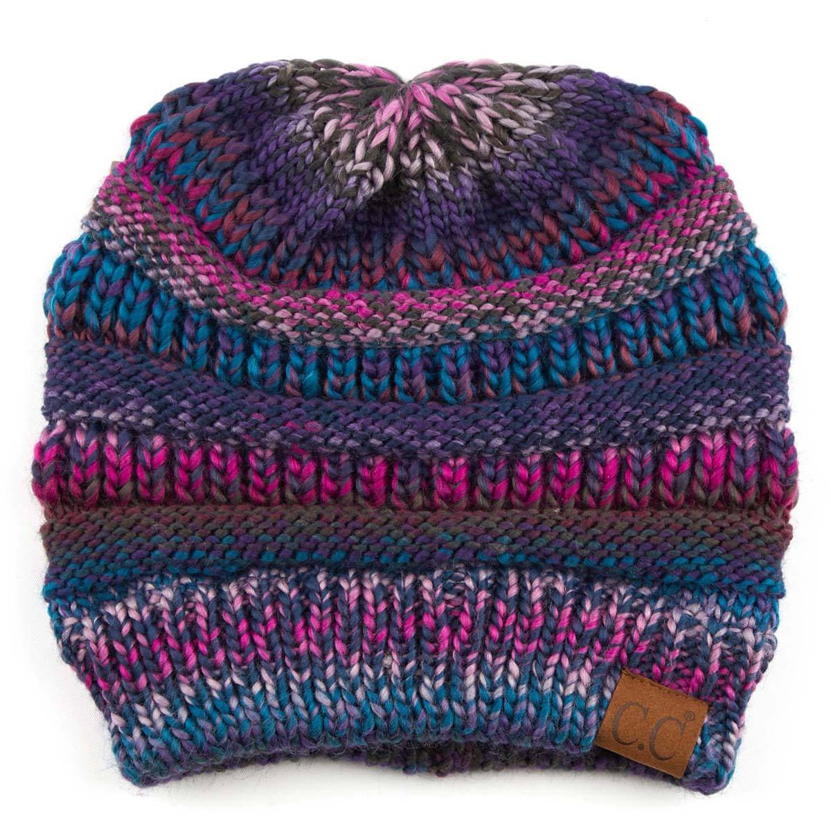 CC Comfy Striped Beanie featuring cable knit texture and multi-color yarn, perfect for cold weather.