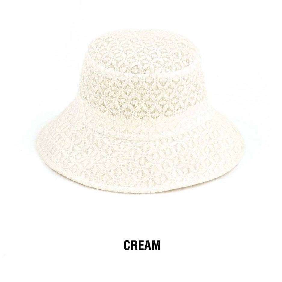 CC Eyelet Knit Bucket Hat featuring a stylish lace eyelet pattern, adjustable fit, and foldable design for travel.