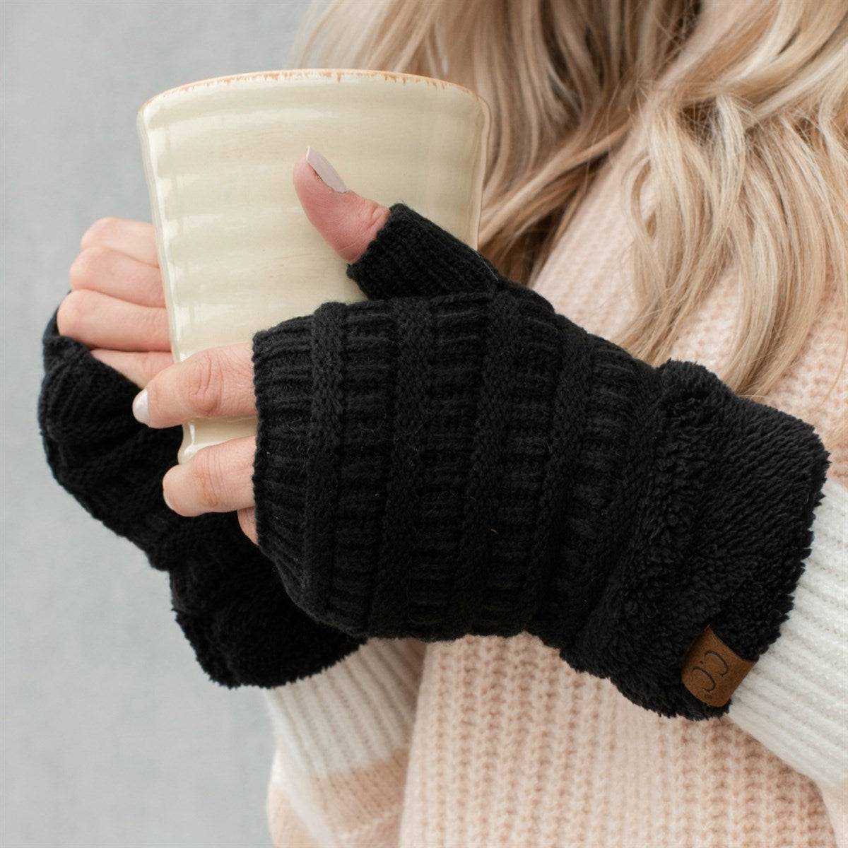 C.C Fingerless Gloves in various colors with faux fur lining, showcasing a stylish cable knit design.