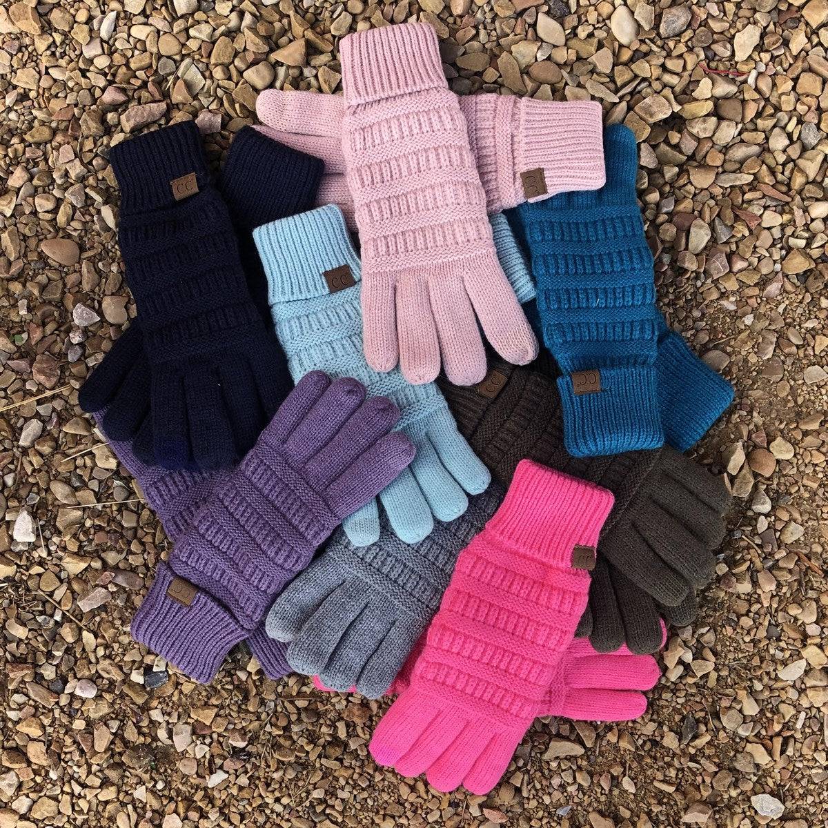 A pair of CC Fleece-Lined Touchscreen Gloves in various colors, showcasing their soft fleece lining and tech-touch compatible fingertips.