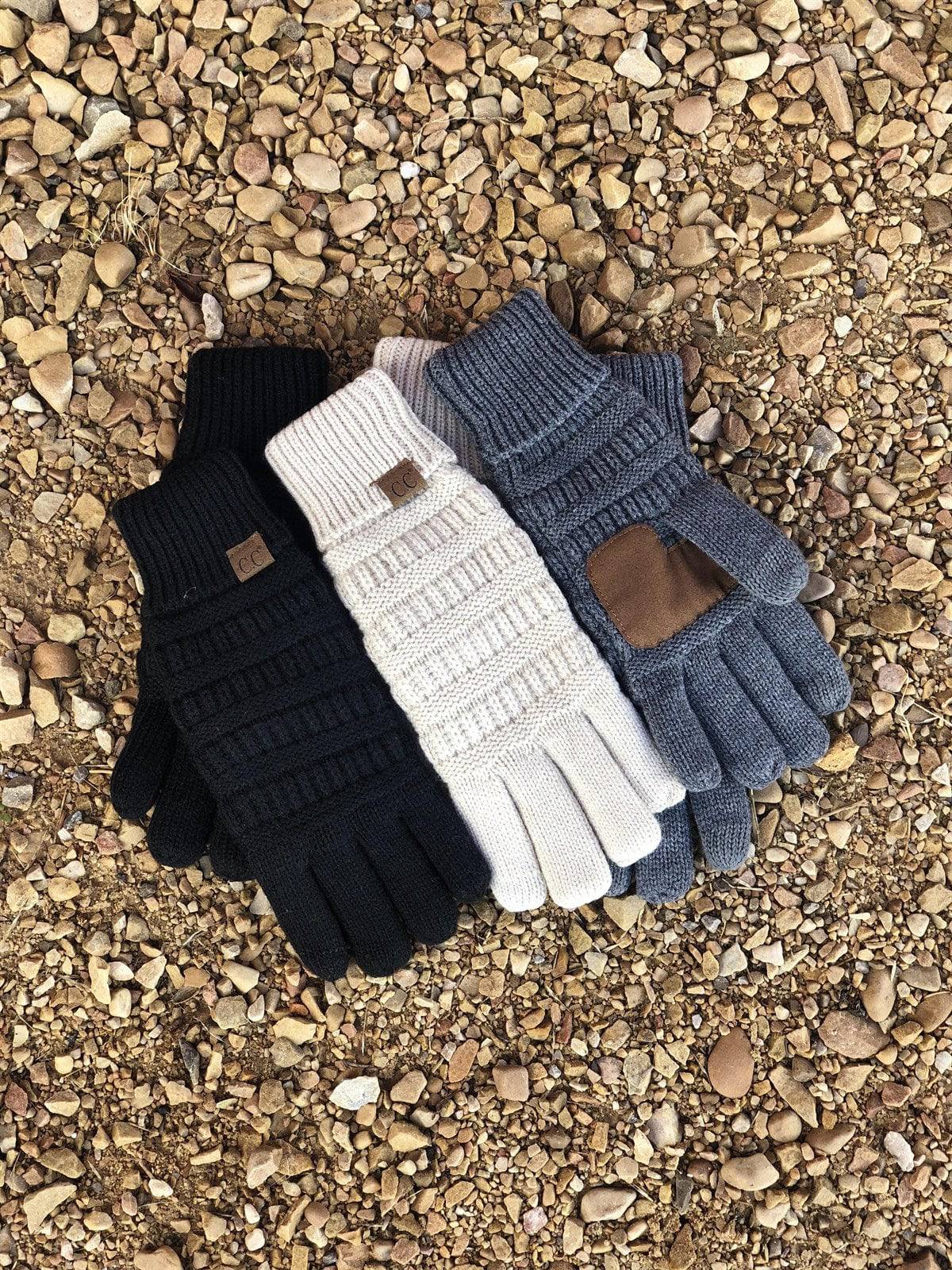 A pair of CC Fleece-Lined Touchscreen Gloves in various colors, showcasing their soft fleece lining and tech-touch compatible fingertips.