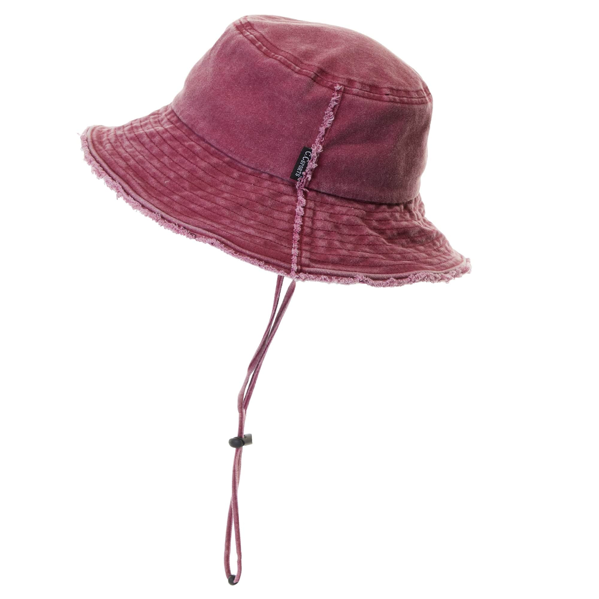 CC Frayed Washed Denim Bucket Hat with frayed edges and wide brim, perfect for sun protection and outdoor activities.