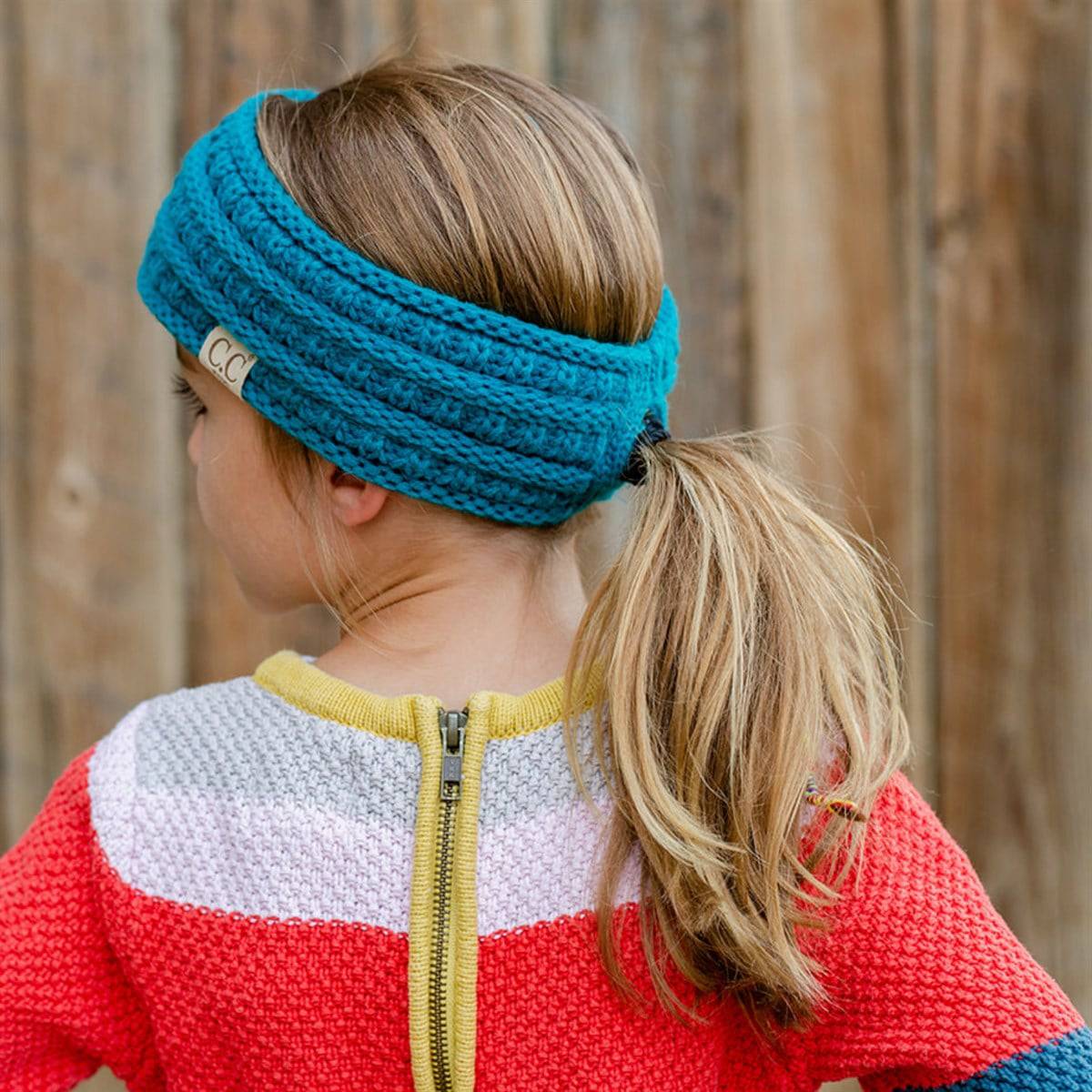 CC Kids Head Band Pony Opening in various colors, featuring a back ponytail access and fleece lining for warmth.