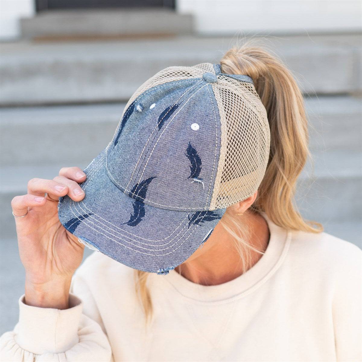 CC Leaf Motif Jacquard Denim Pony Cap featuring a stylish leaf pattern, adjustable velcro strap, and ponytail opening, suitable for women, teens, and kids.