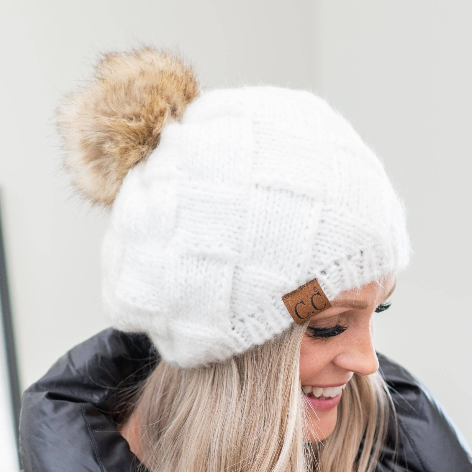 CC Leisure Beret Cadet Cap featuring a basket weave design and faux fur pom, perfect for stylish comfort.