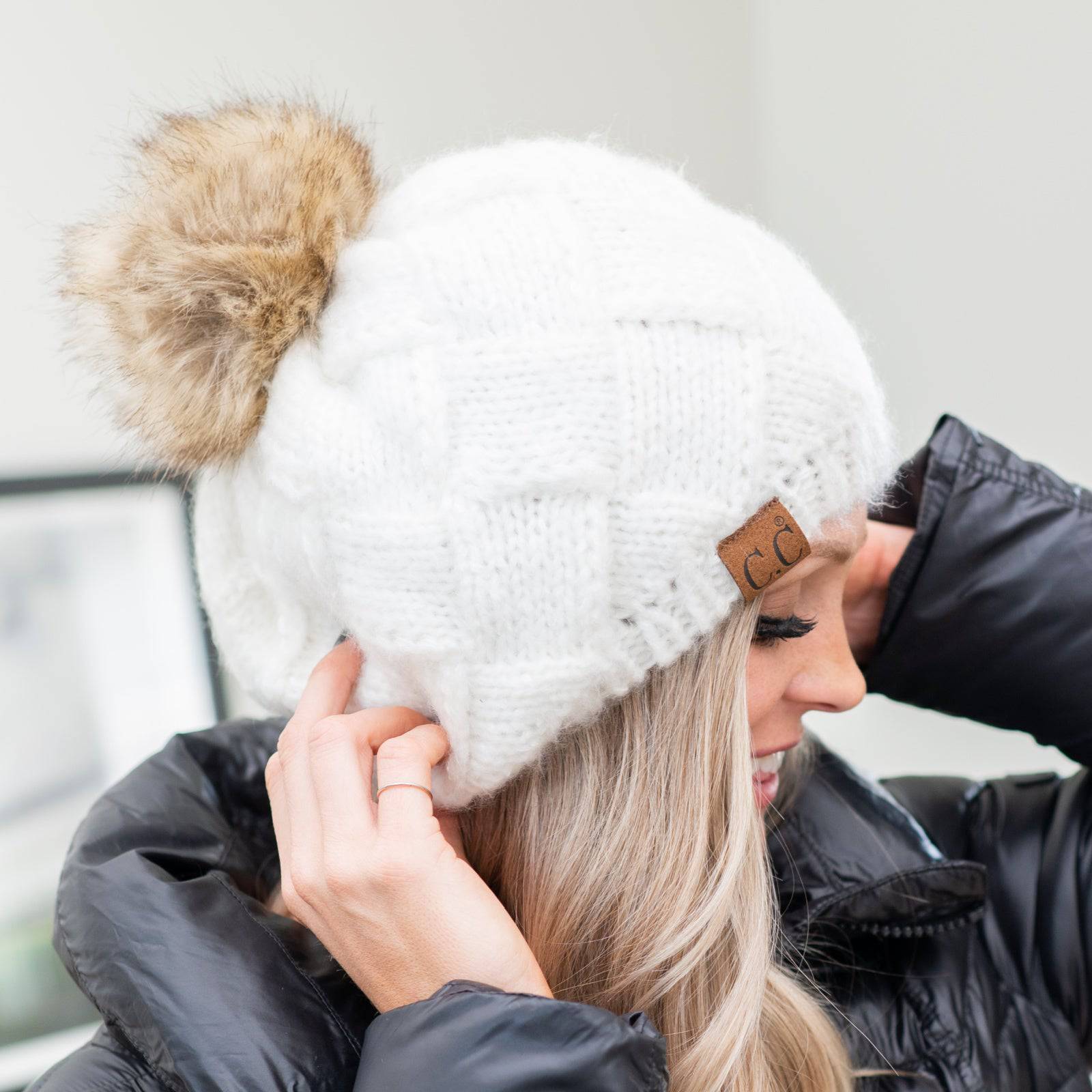 CC Leisure Beret Cadet Cap featuring a basket weave design and faux fur pom, perfect for stylish comfort.