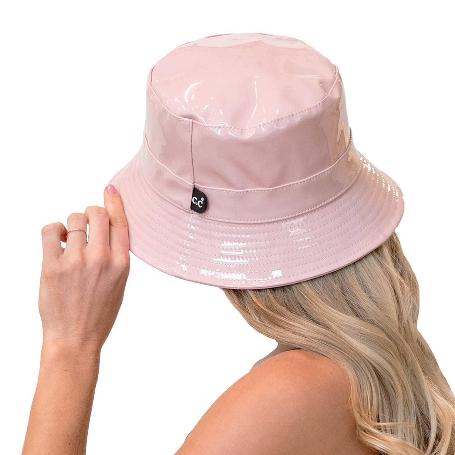 CC Luxury Waterproof Bucket Hat in various colors, showcasing its stylish design and adjustable inner band.