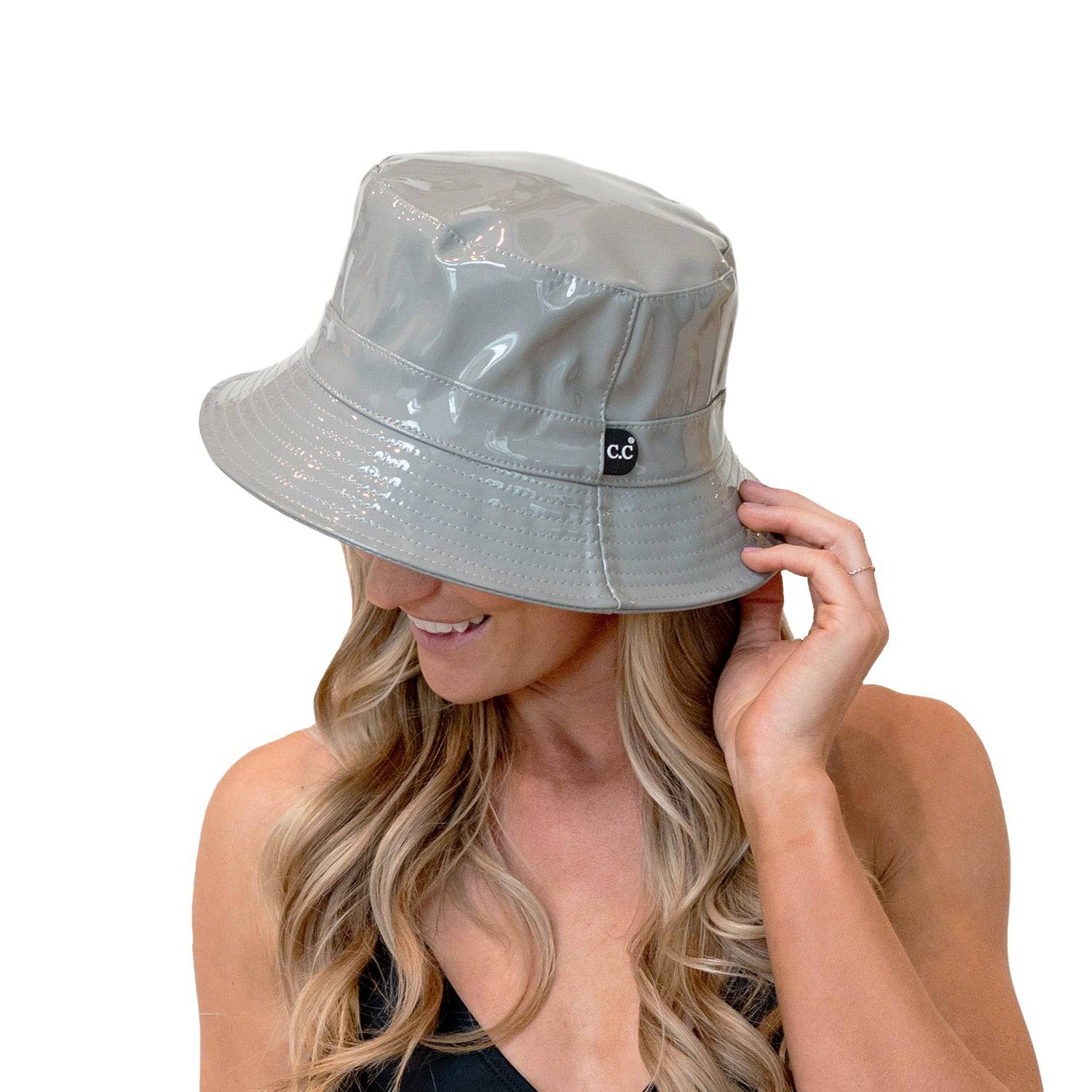 CC Luxury Waterproof Bucket Hat in various colors, showcasing its stylish design and adjustable inner band.