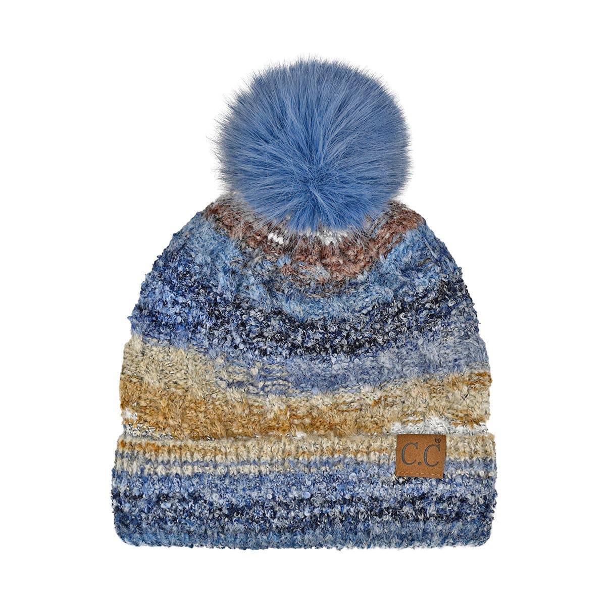 CC Multi Color Space Dye Pom Beanie featuring a vibrant multi-color design and a fluffy faux fur pom on top, suitable for teens and adults.