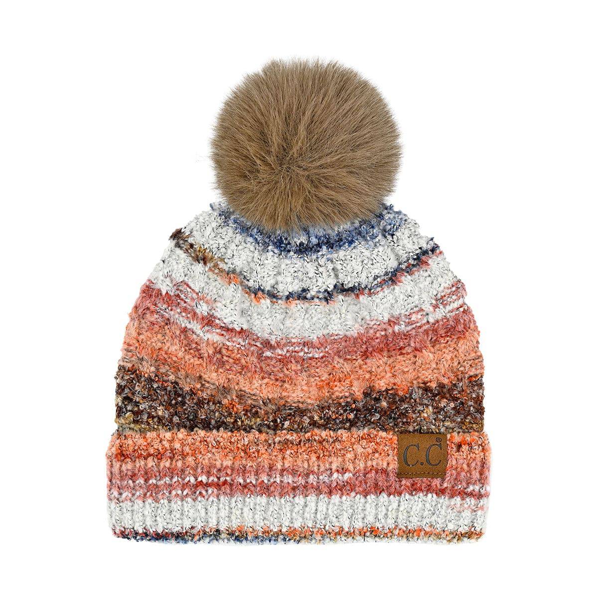 CC Multi Color Space Dye Pom Beanie featuring a vibrant multi-color design and a fluffy faux fur pom on top, suitable for teens and adults.