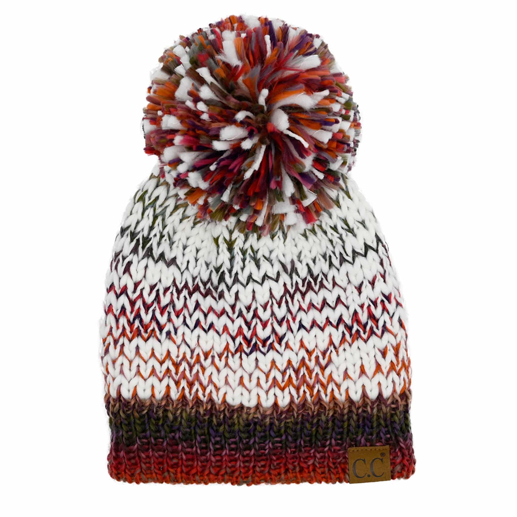 CC Multi-Color Yarn Beanie with Pom, featuring vibrant colors and a soft lining, perfect for winter wear.