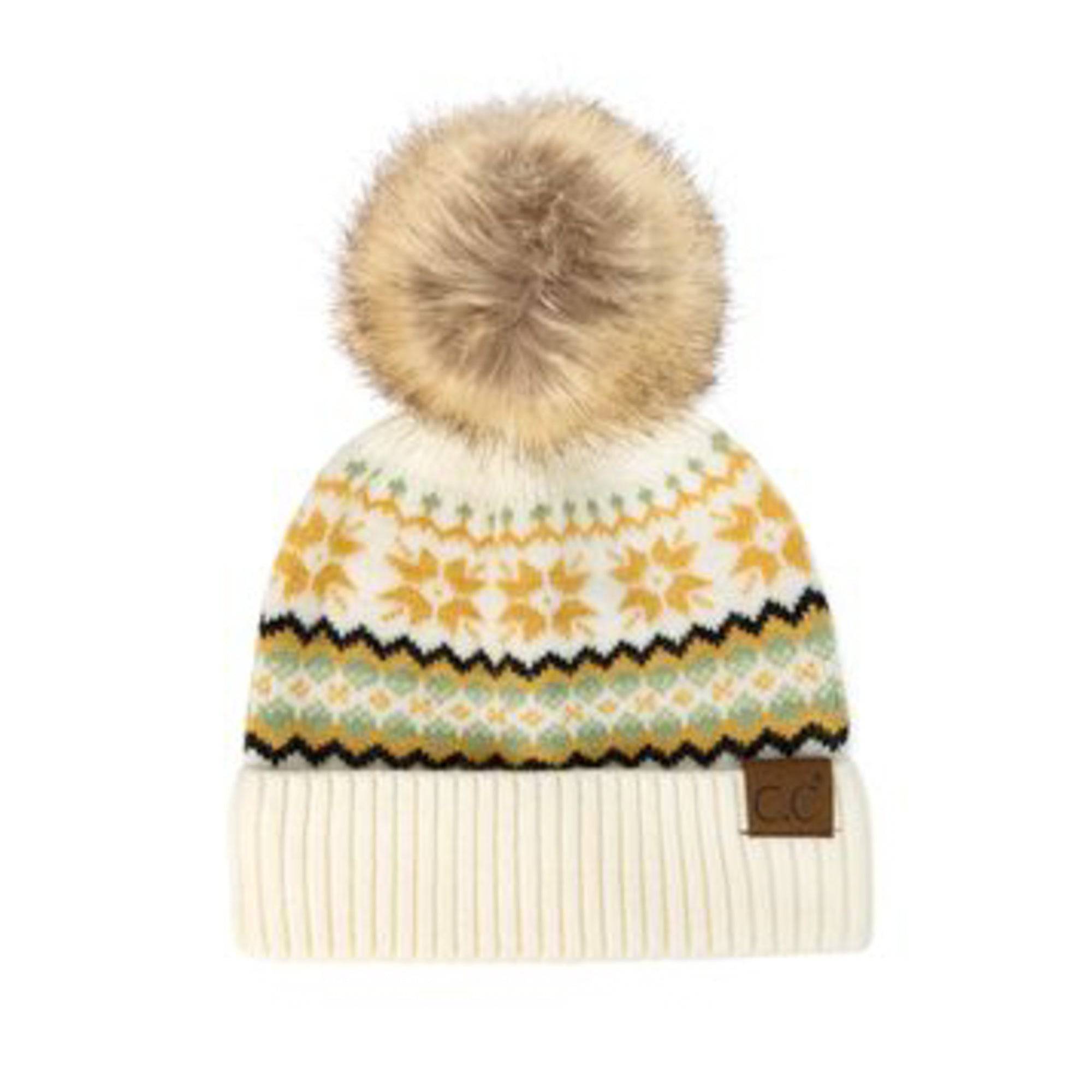 CC Nordic Fair Isle Beanie with faux fur pom, featuring a festive Fair Isle print, perfect for winter wear.