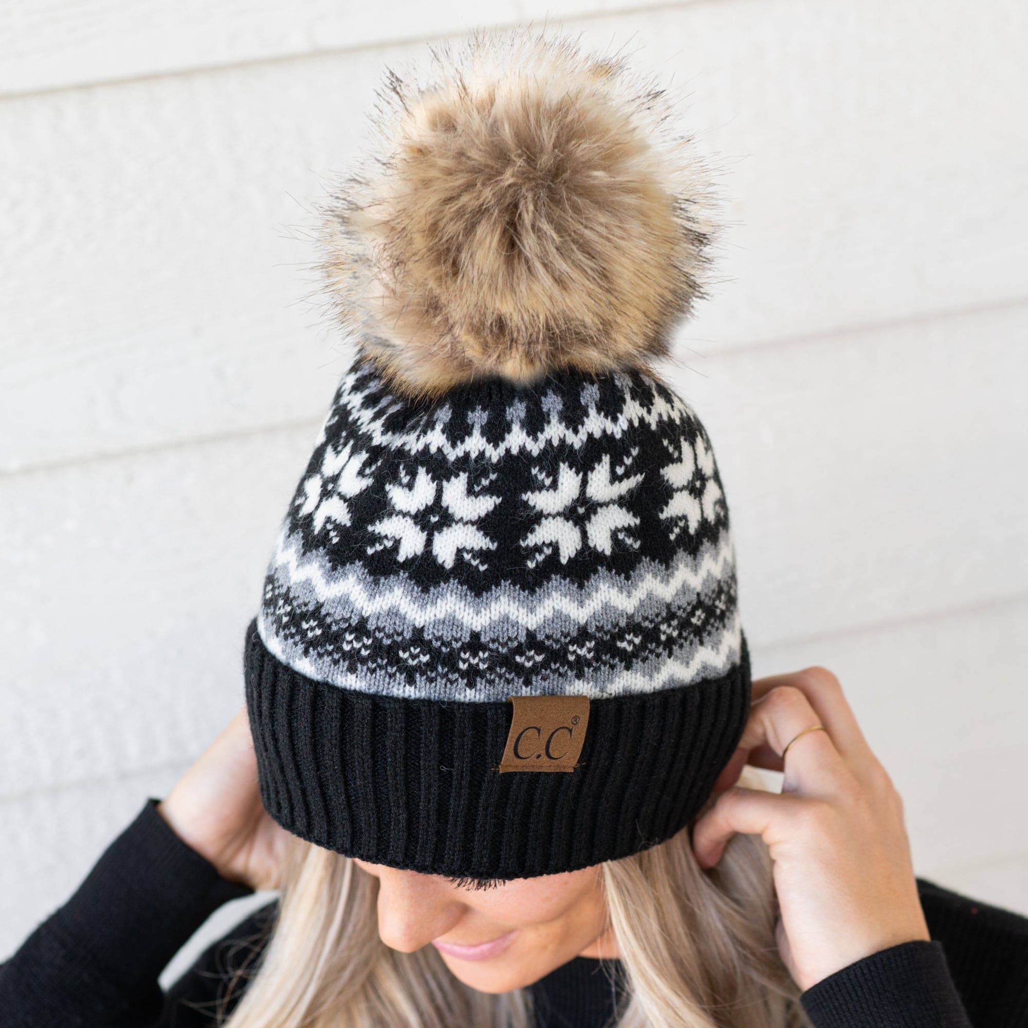 CC Nordic Fair Isle Beanie with faux fur pom, featuring a festive Fair Isle print, perfect for winter wear.