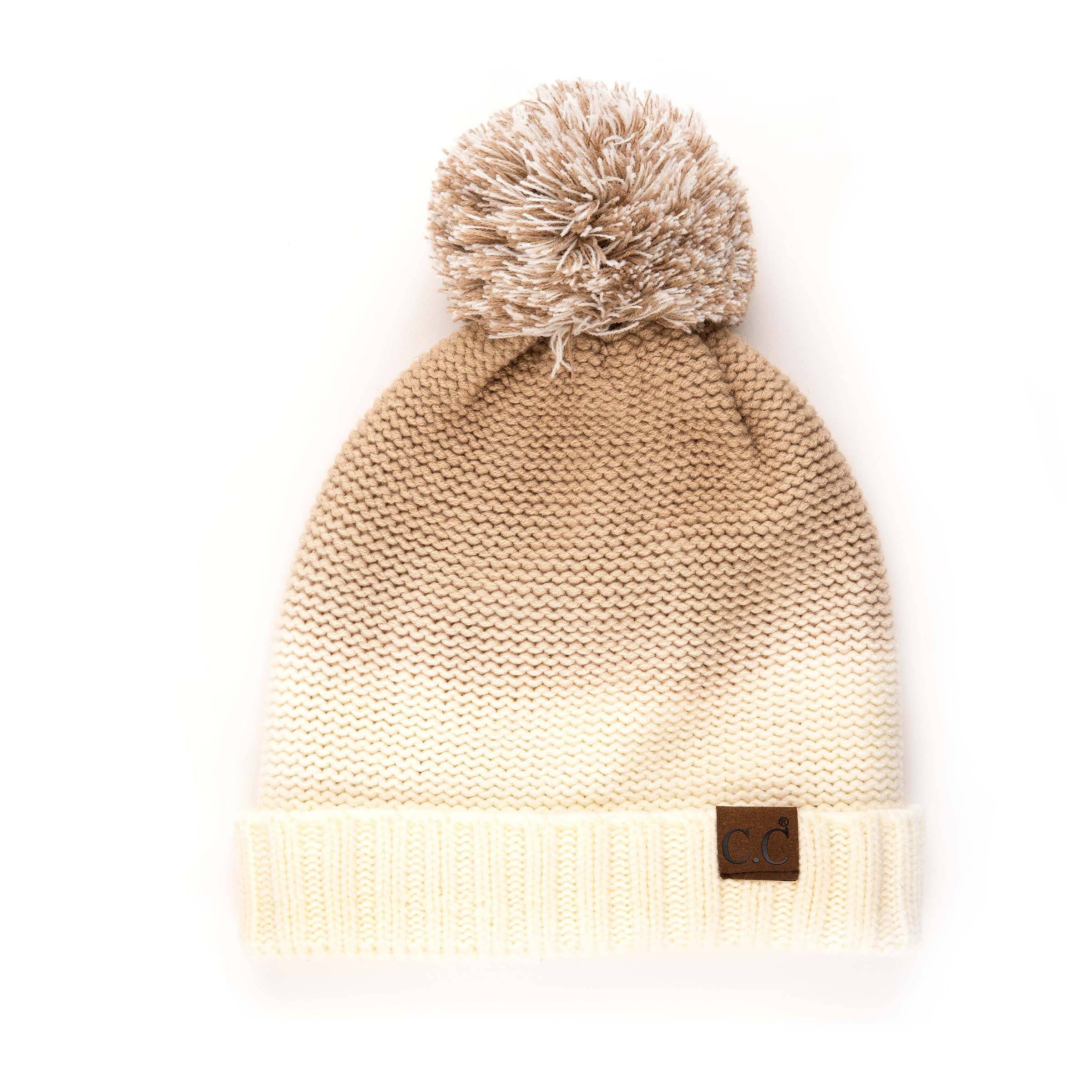 CC Ombre Beanie featuring a trendy ombre pattern and yarn pom, fleece lined for warmth and comfort.