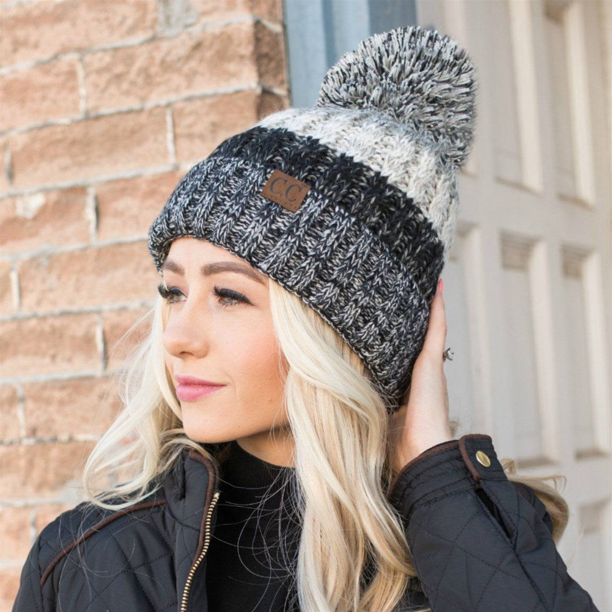 CC Park City Trending Beanie featuring Yarn Pom and multi-color stitching, fleece lined for warmth and comfort.