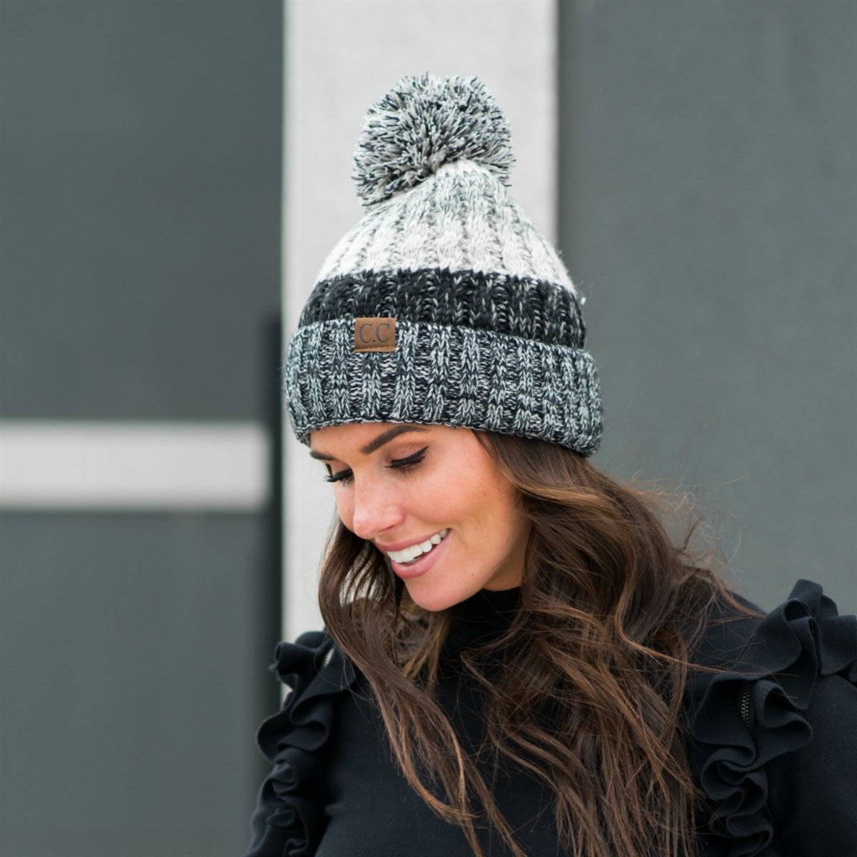 CC Park City Trending Beanie featuring Yarn Pom and multi-color stitching, fleece lined for warmth and comfort.