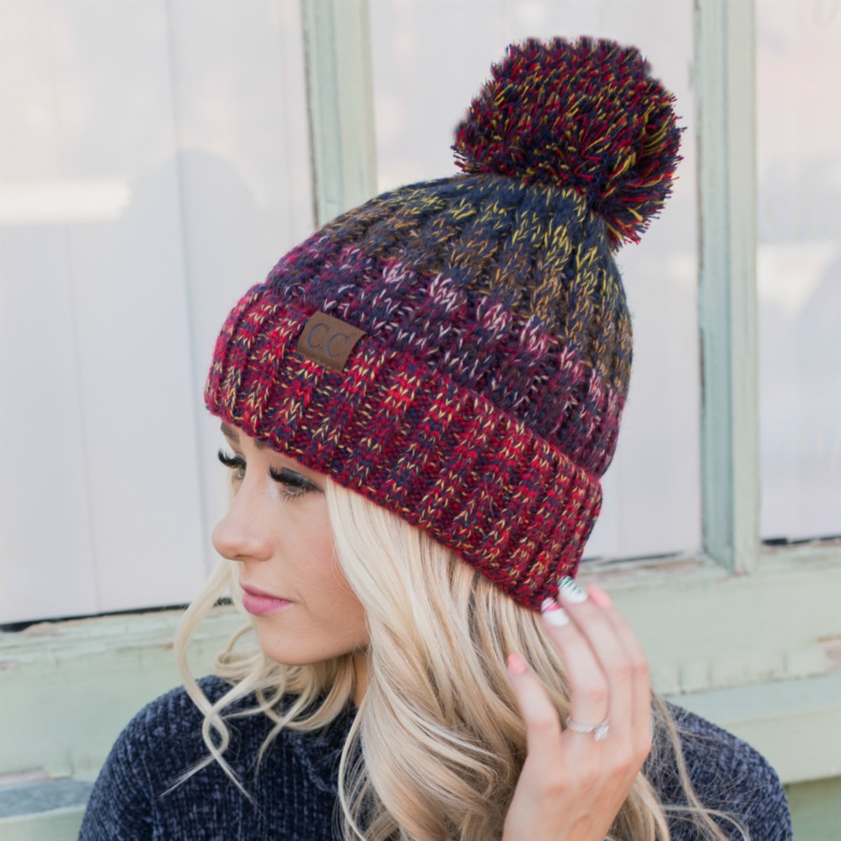 CC Park City Trending Beanie featuring Yarn Pom and multi-color stitching, fleece lined for warmth and comfort.