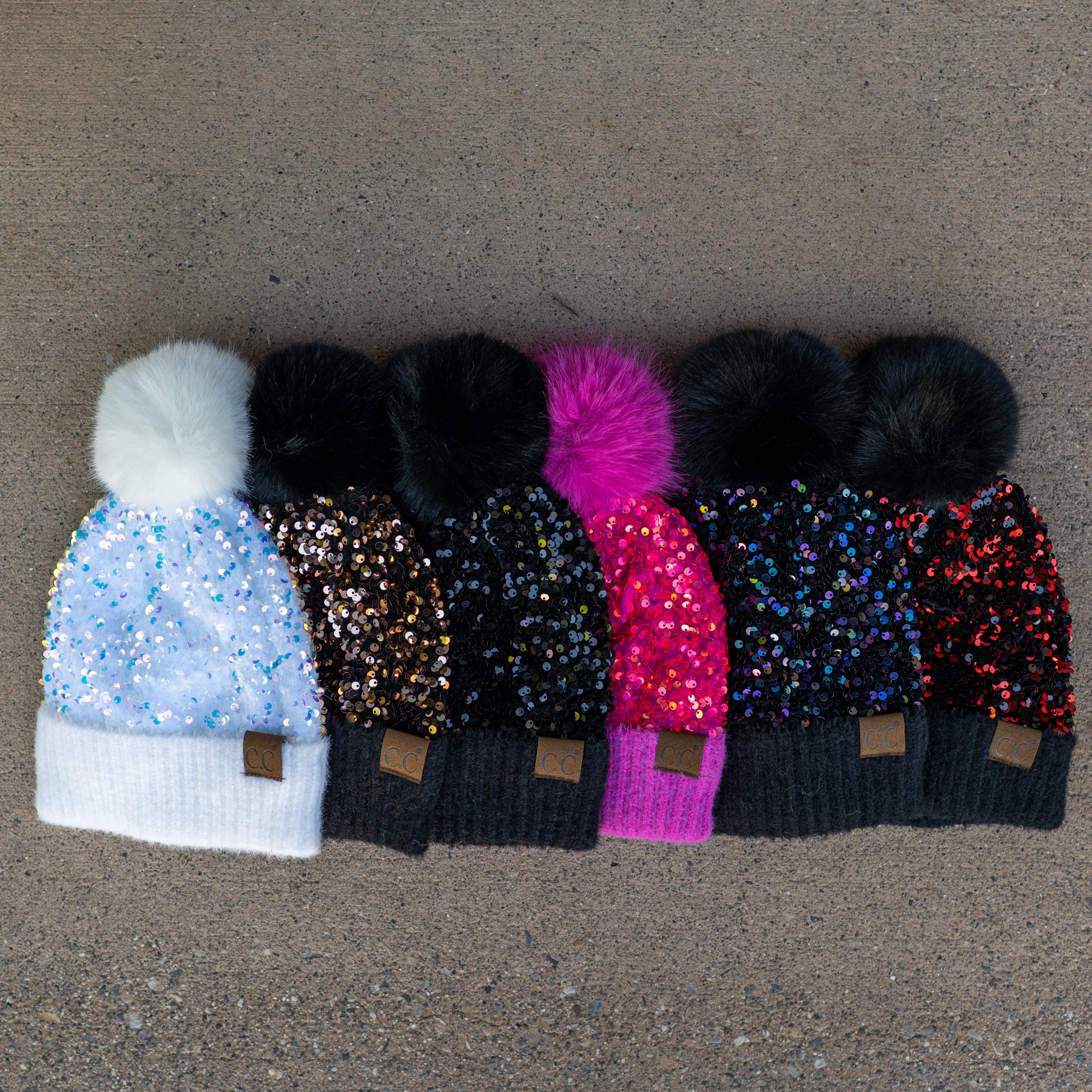 CC Sequin Fur Pom Beanie featuring a sparkling sequin design and a plush faux fur pom, available in adult and kid sizes.