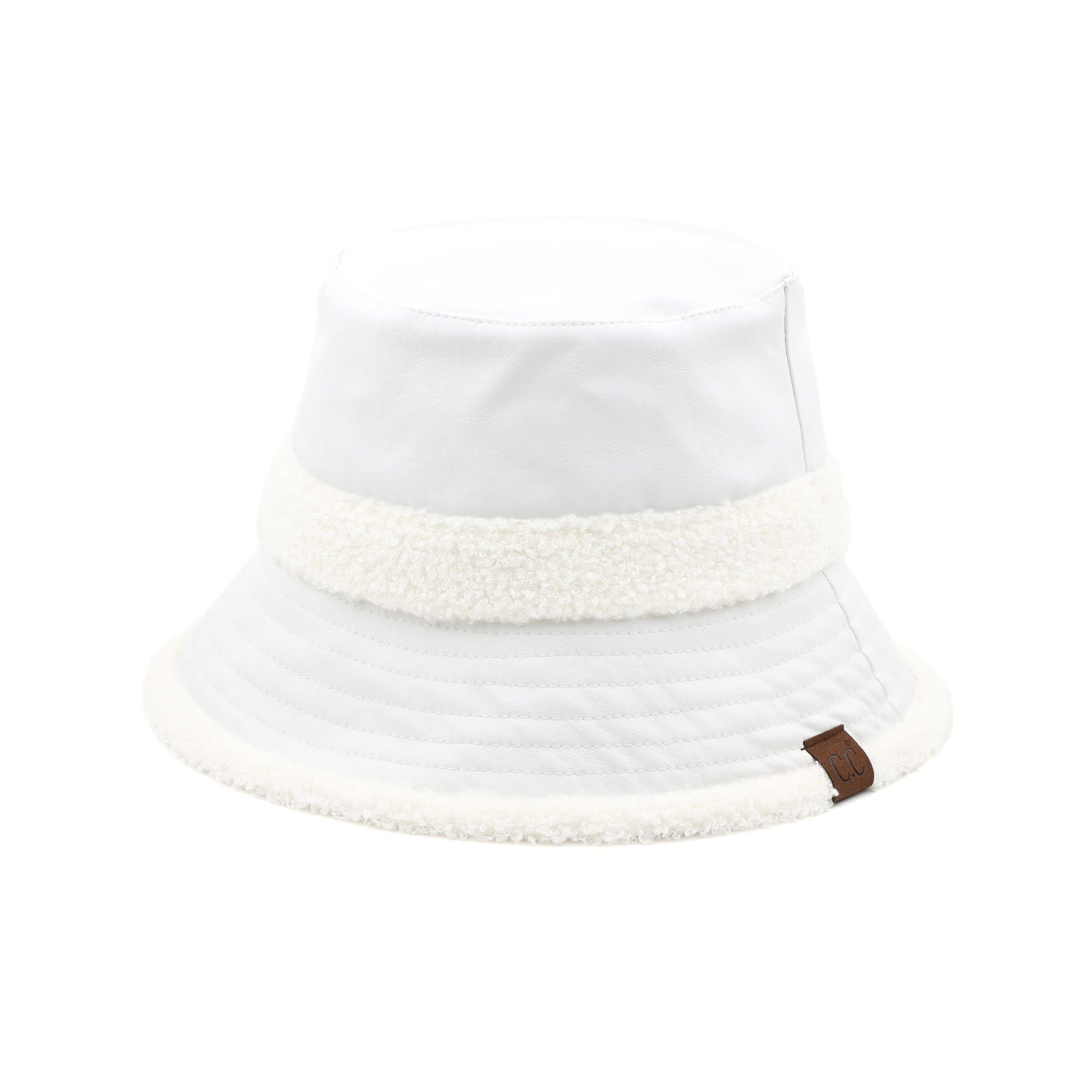 CC Sherpa Accent Reversible Bucket hat in cold weather, showcasing its stylish design and warm material.