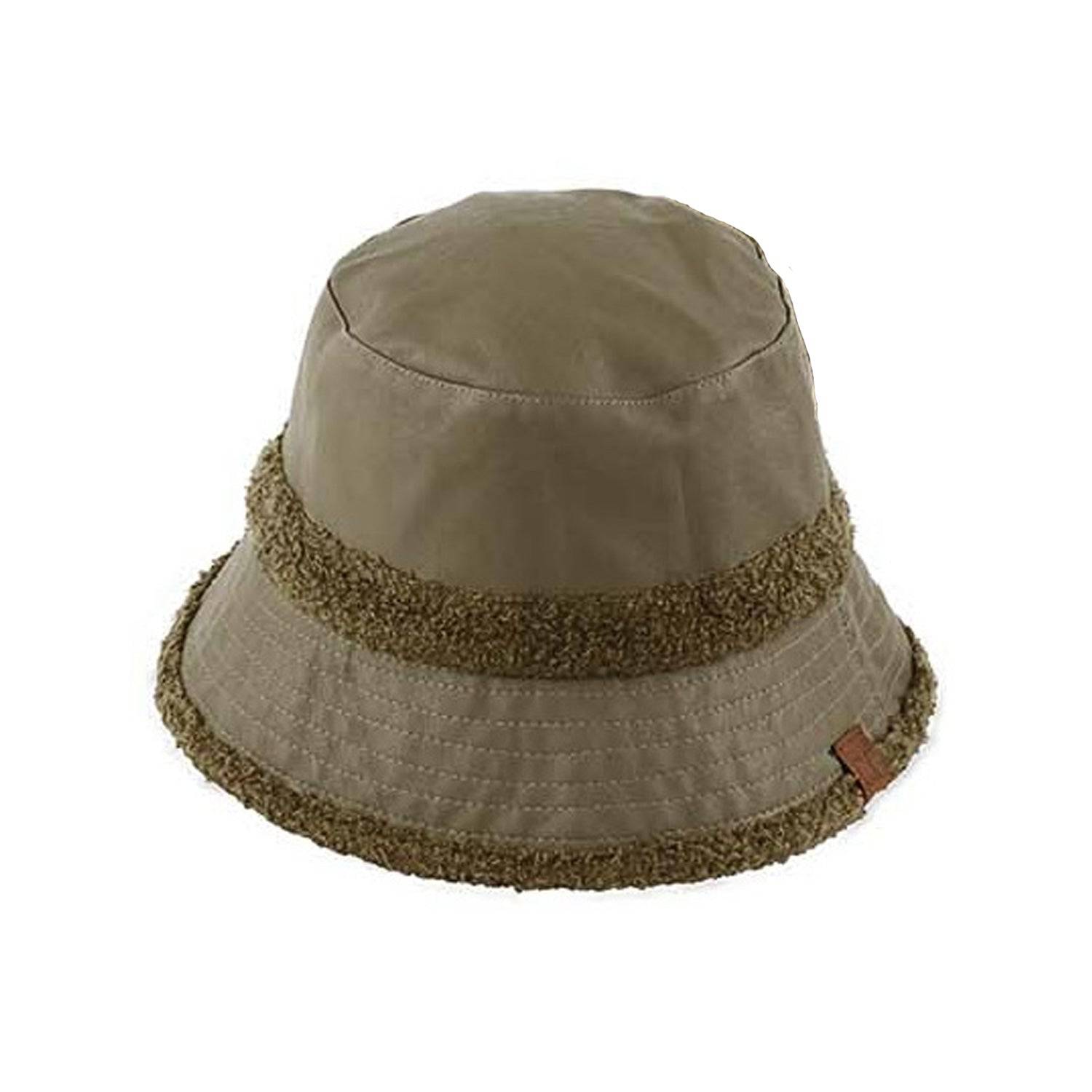 CC Sherpa Accent Reversible Bucket hat in cold weather, showcasing its stylish design and warm material.