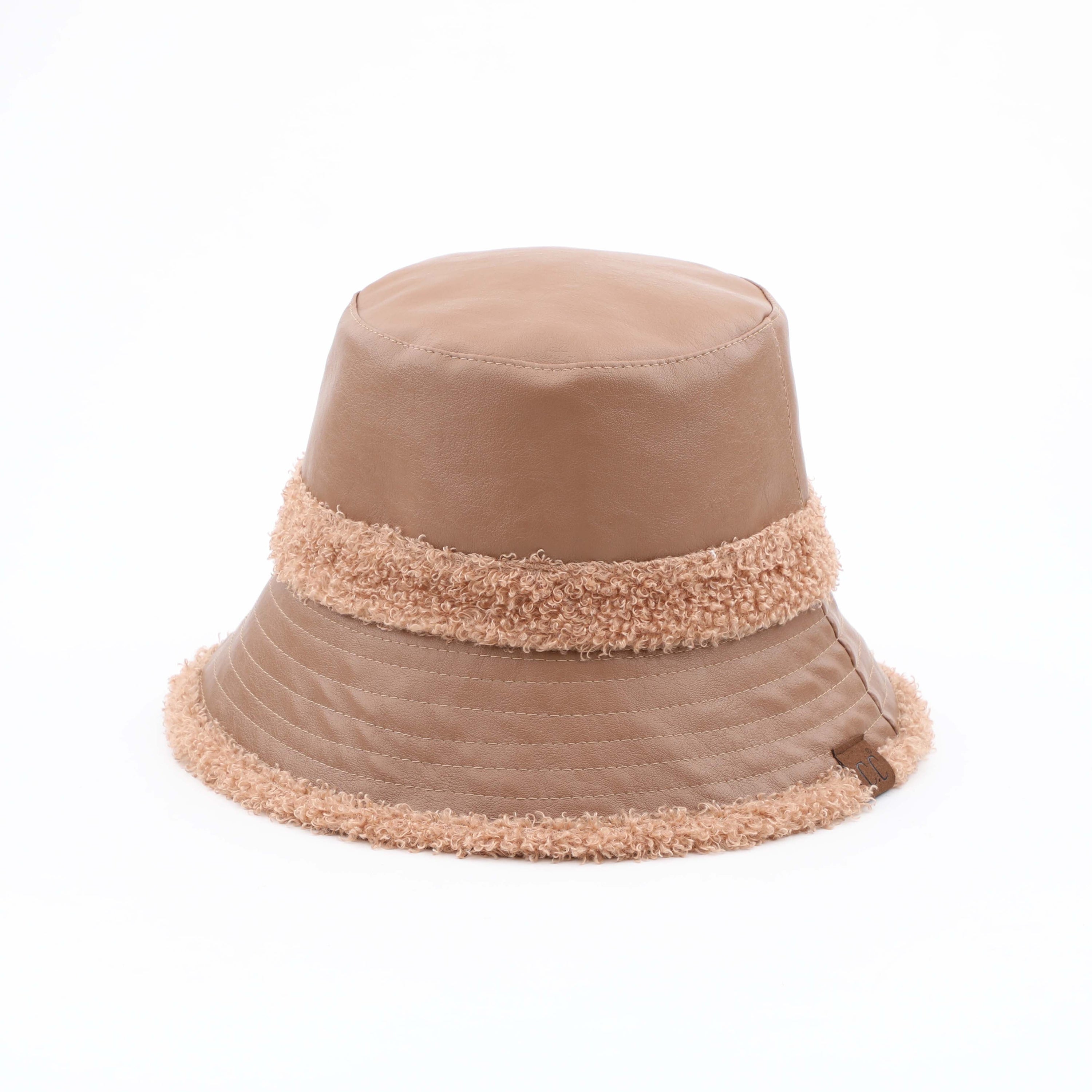 CC Sherpa Accent Reversible Bucket hat in cold weather, showcasing its stylish design and warm material.