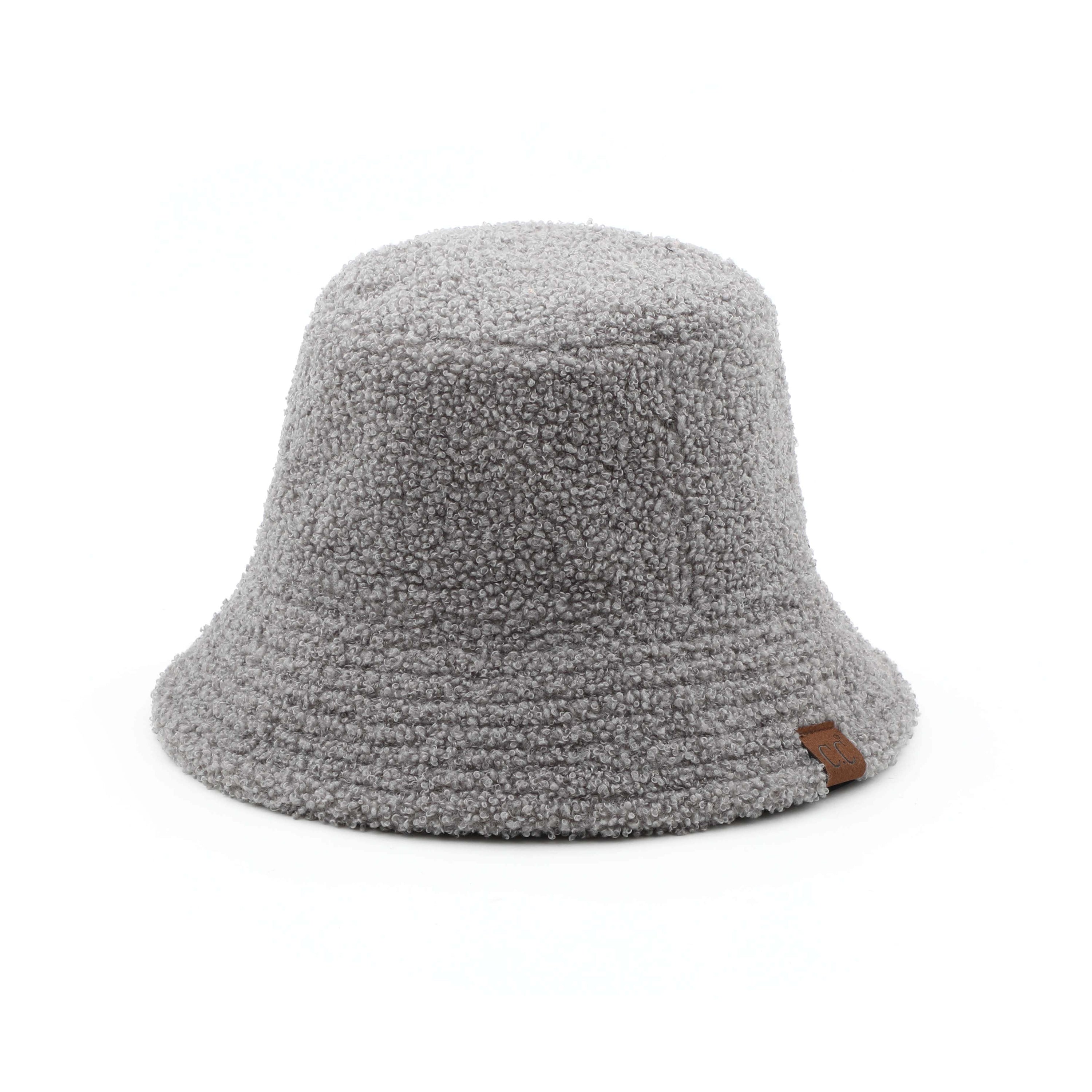 CC Sherpa Accent Reversible Bucket hat in cold weather, showcasing its stylish design and warm material.