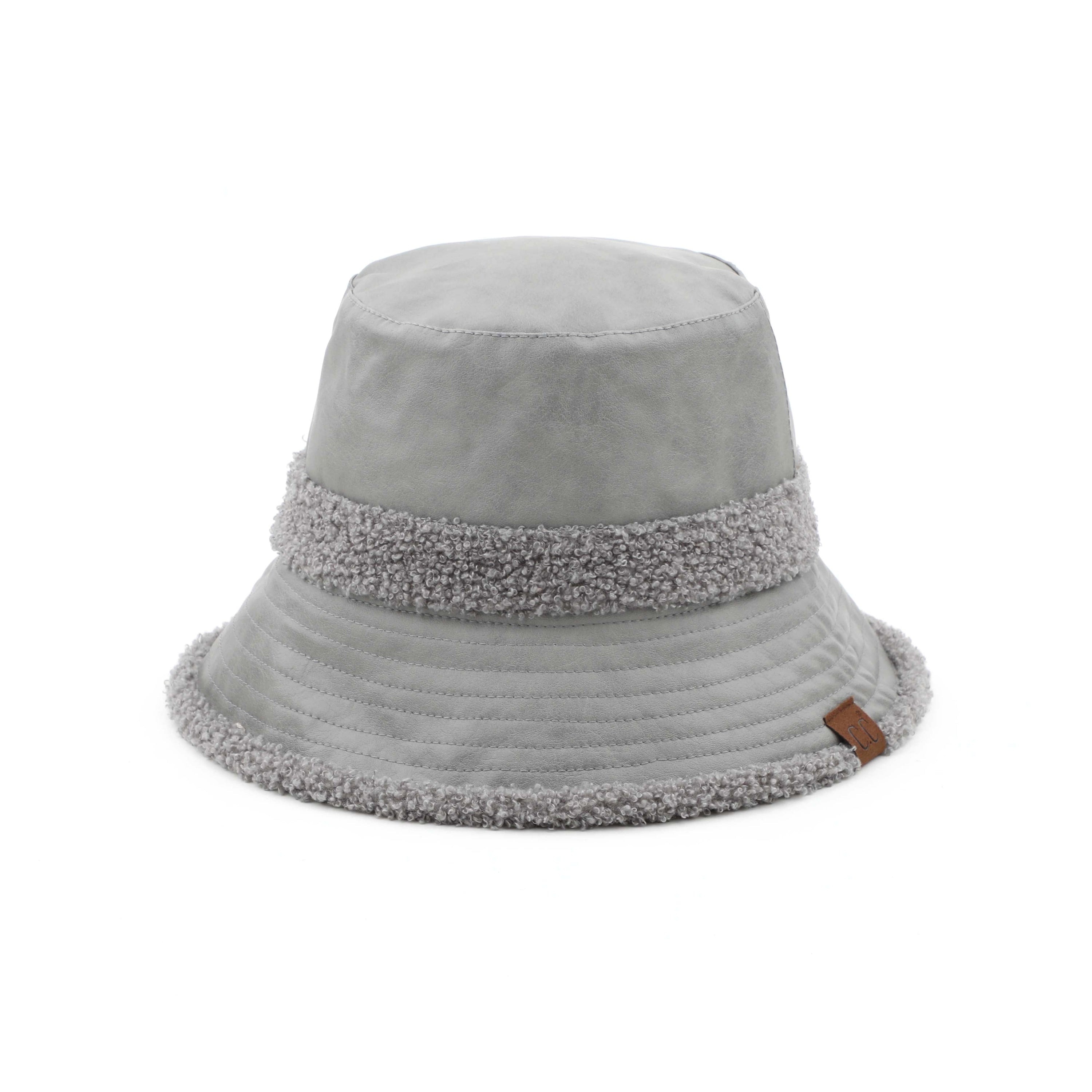 CC Sherpa Accent Reversible Bucket hat in cold weather, showcasing its stylish design and warm material.