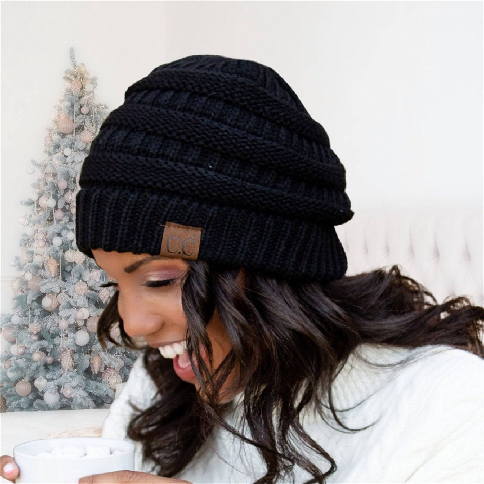 CC Snuggly Soft Yarn Beanie featuring a stylish cable knit design, made from soft yarn for warmth and comfort.