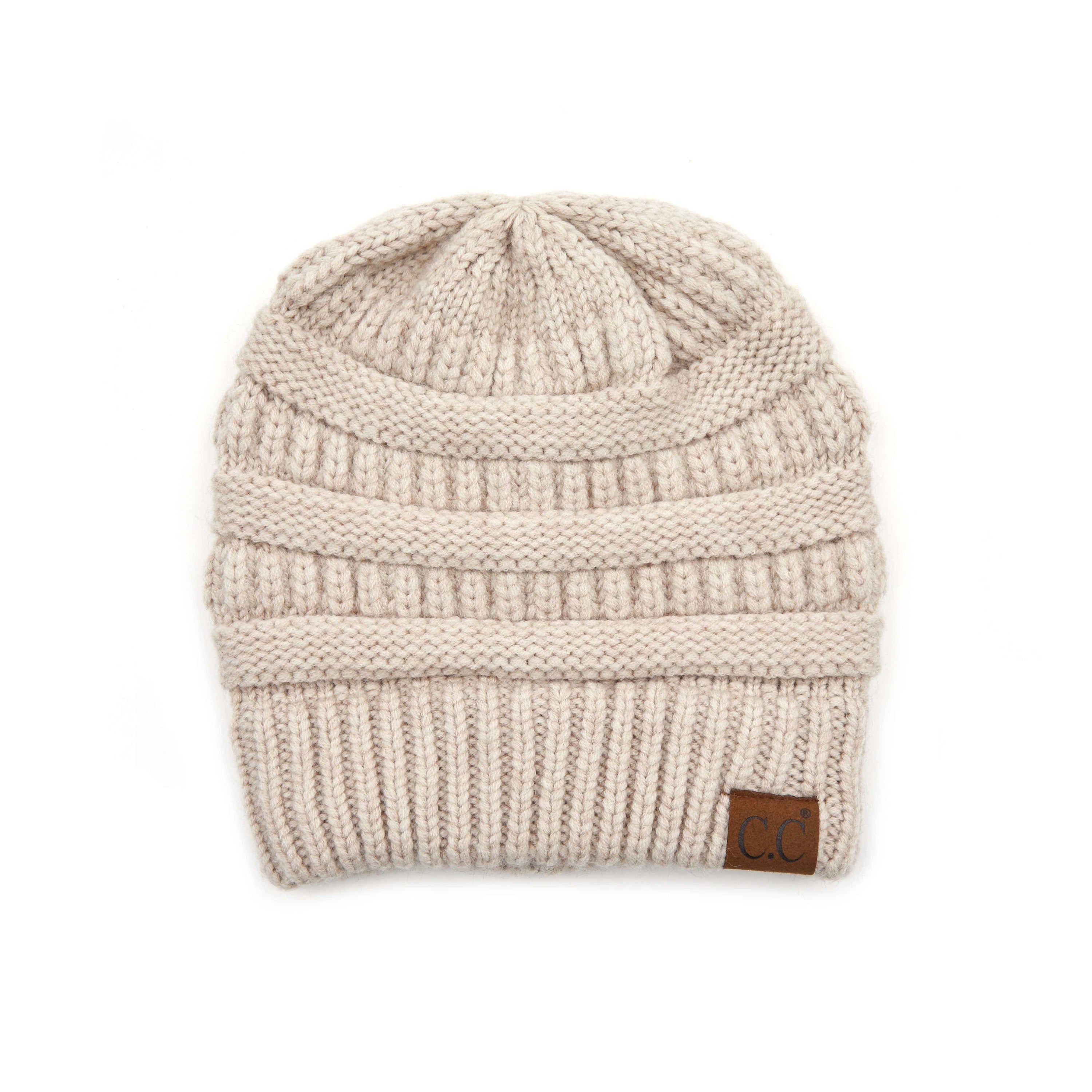 CC Snuggly Soft Yarn Beanie featuring a stylish cable knit design, made from soft yarn for warmth and comfort.