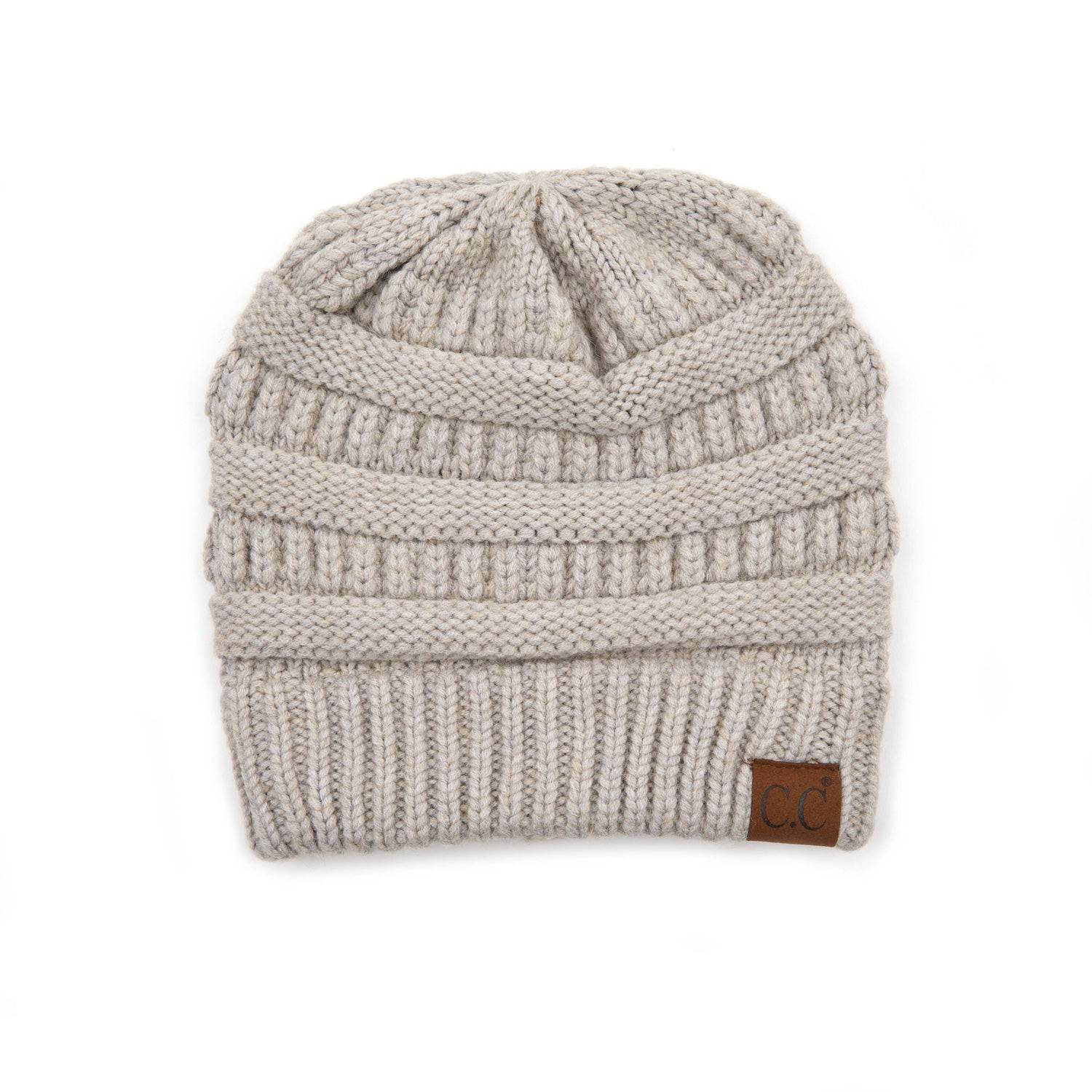 CC Snuggly Soft Yarn Beanie featuring a stylish cable knit design, made from soft yarn for warmth and comfort.