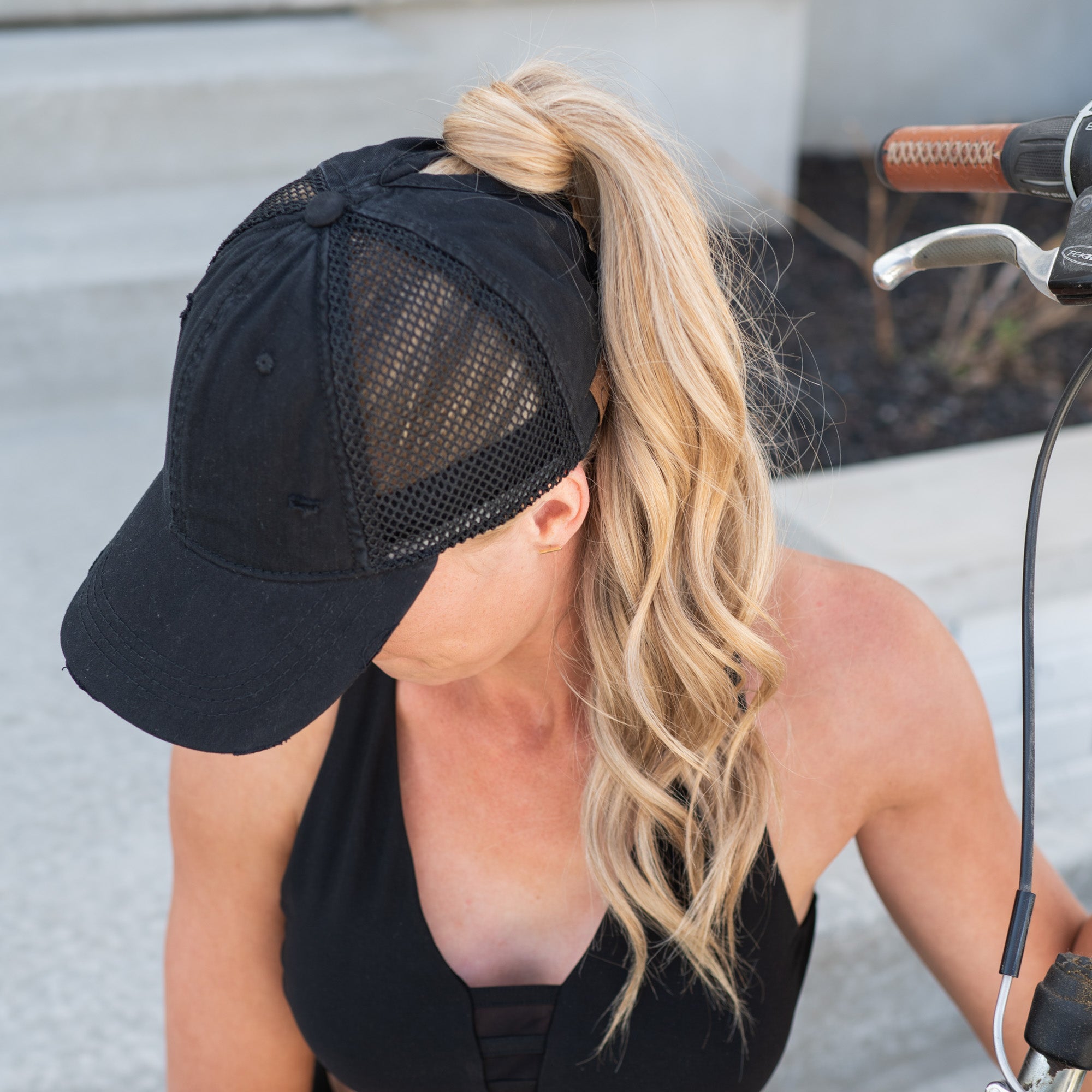 CC Solid Cotton Athleisure Cap featuring ponytail access, adjustable strap, and soft cotton material, suitable for women, teens, and kids.