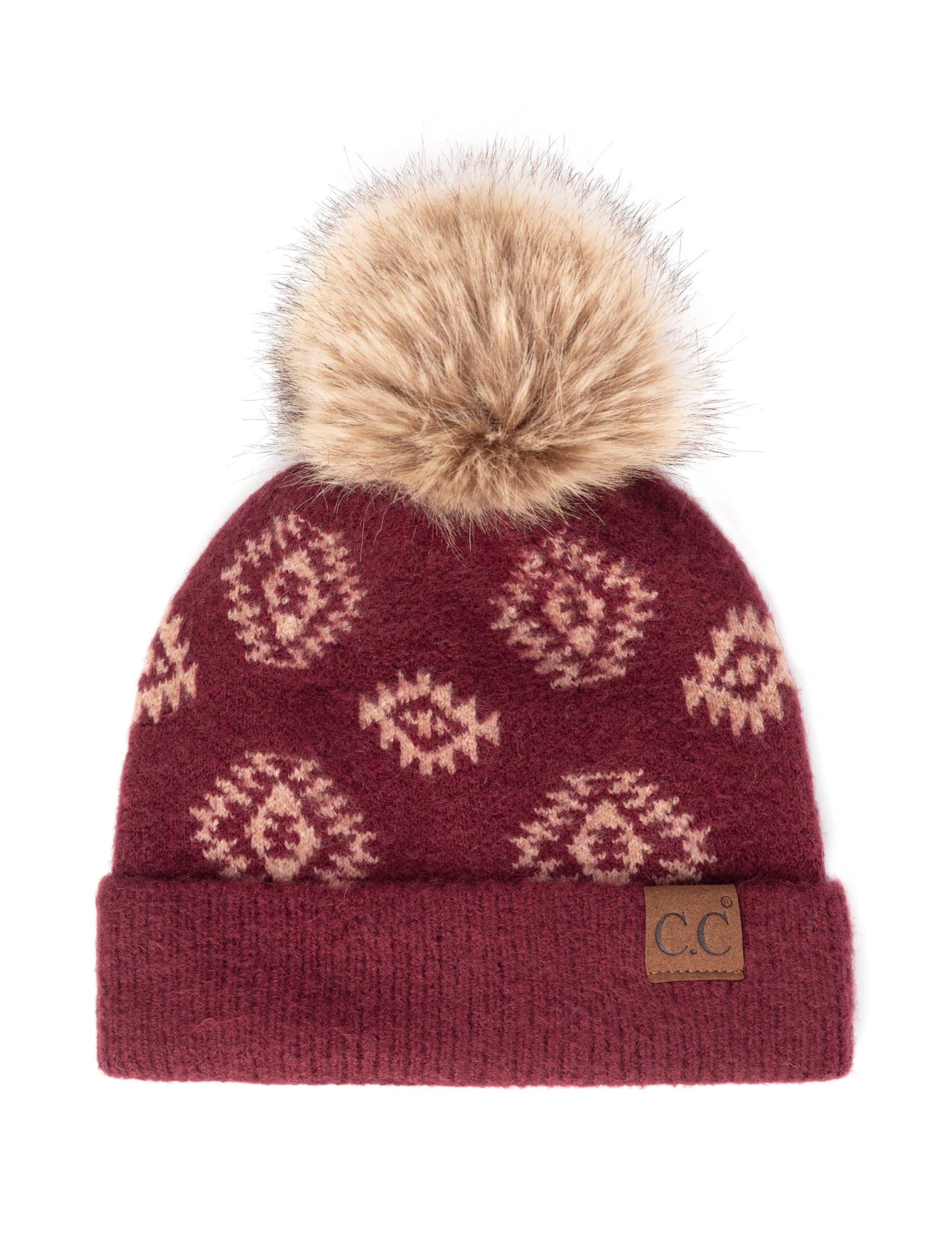 CC South Western Solid Beanie featuring a faux fur pom and Aztec print design, perfect for winter wear.