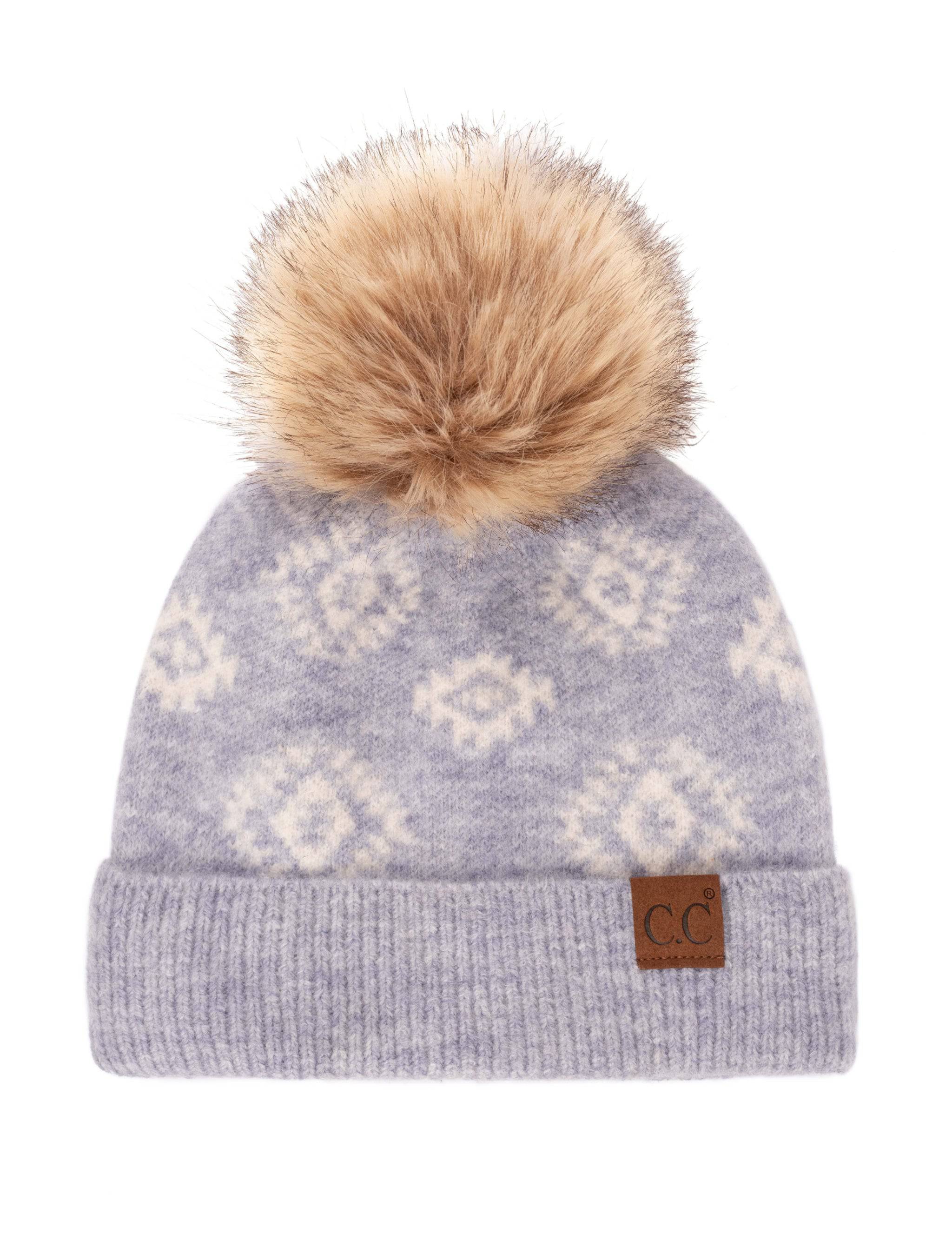 CC South Western Solid Beanie featuring a faux fur pom and Aztec print design, perfect for winter wear.