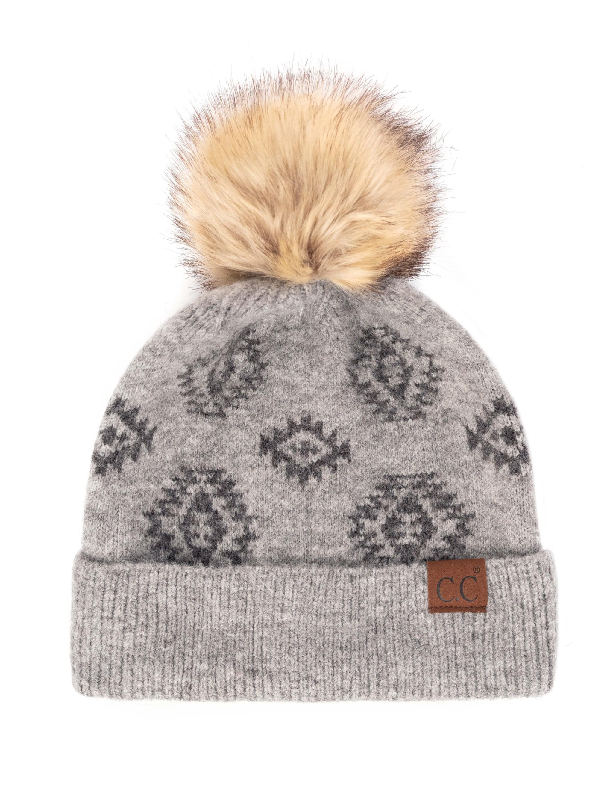 CC South Western Solid Beanie featuring a faux fur pom and Aztec print design, perfect for winter wear.