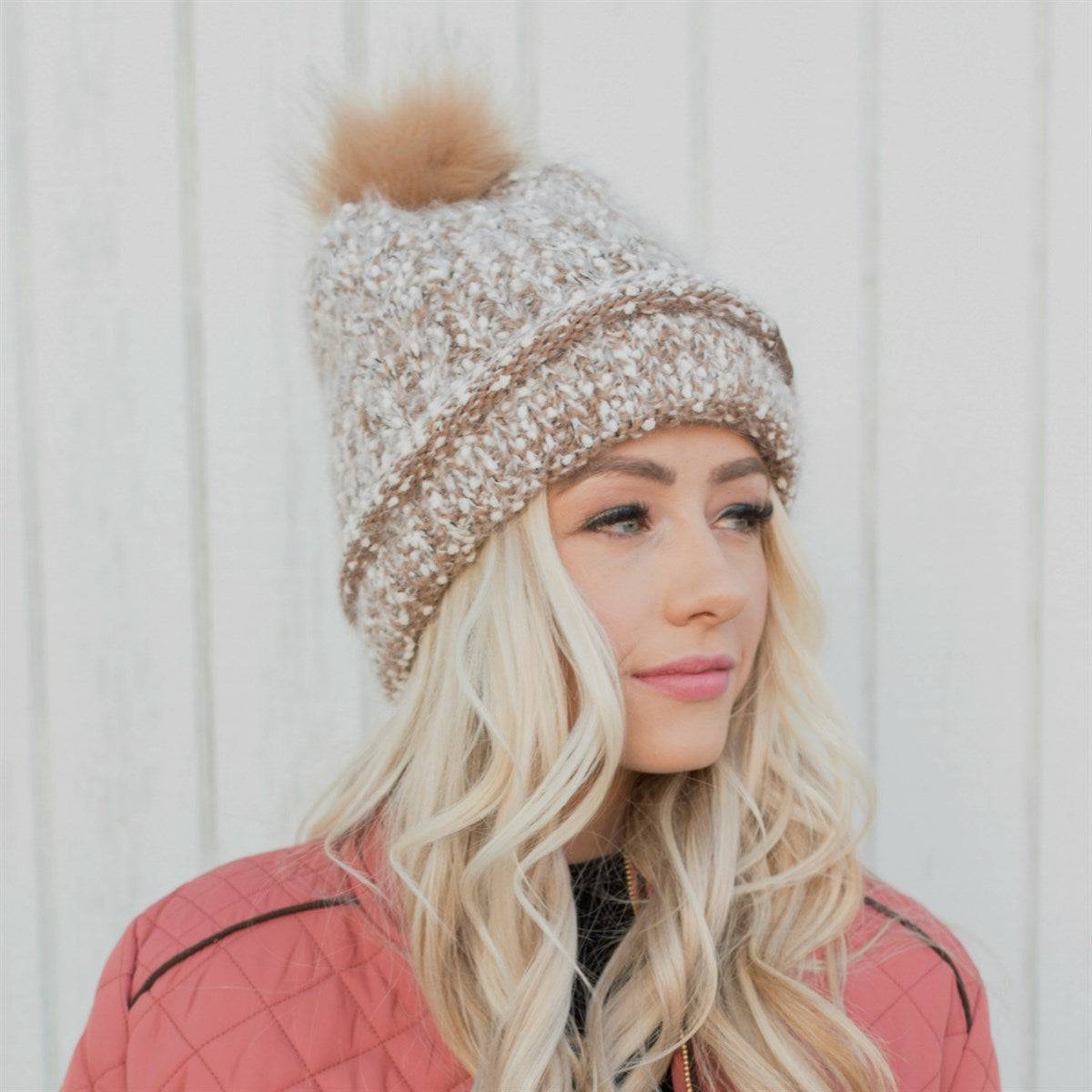 CC Speck Lined Beanie featuring a faux fur pom and speck pattern, perfect for cold weather wear.