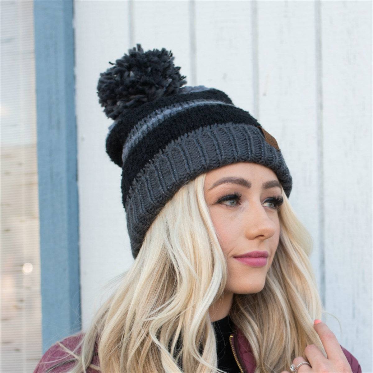 CC Telluride Trending Beanie featuring a yarn pom, fleece lining, and authentic C.C.® branding in a stylish design.