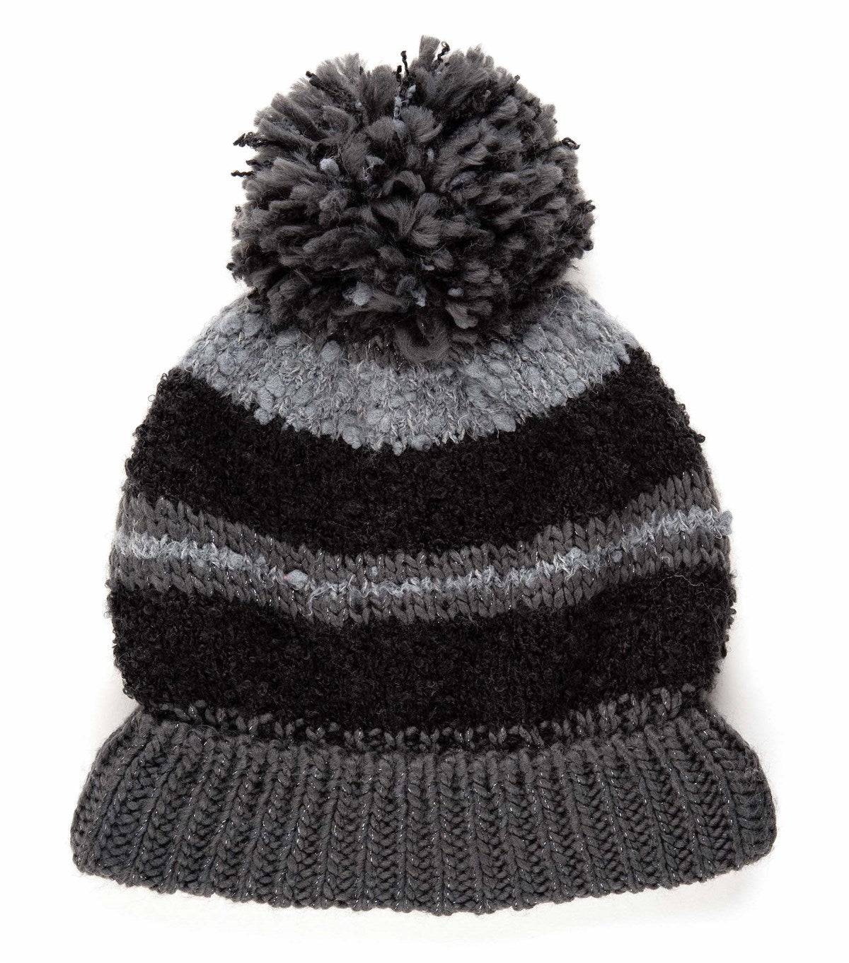 CC Telluride Trending Beanie featuring a yarn pom, fleece lining, and authentic C.C.® branding in a stylish design.