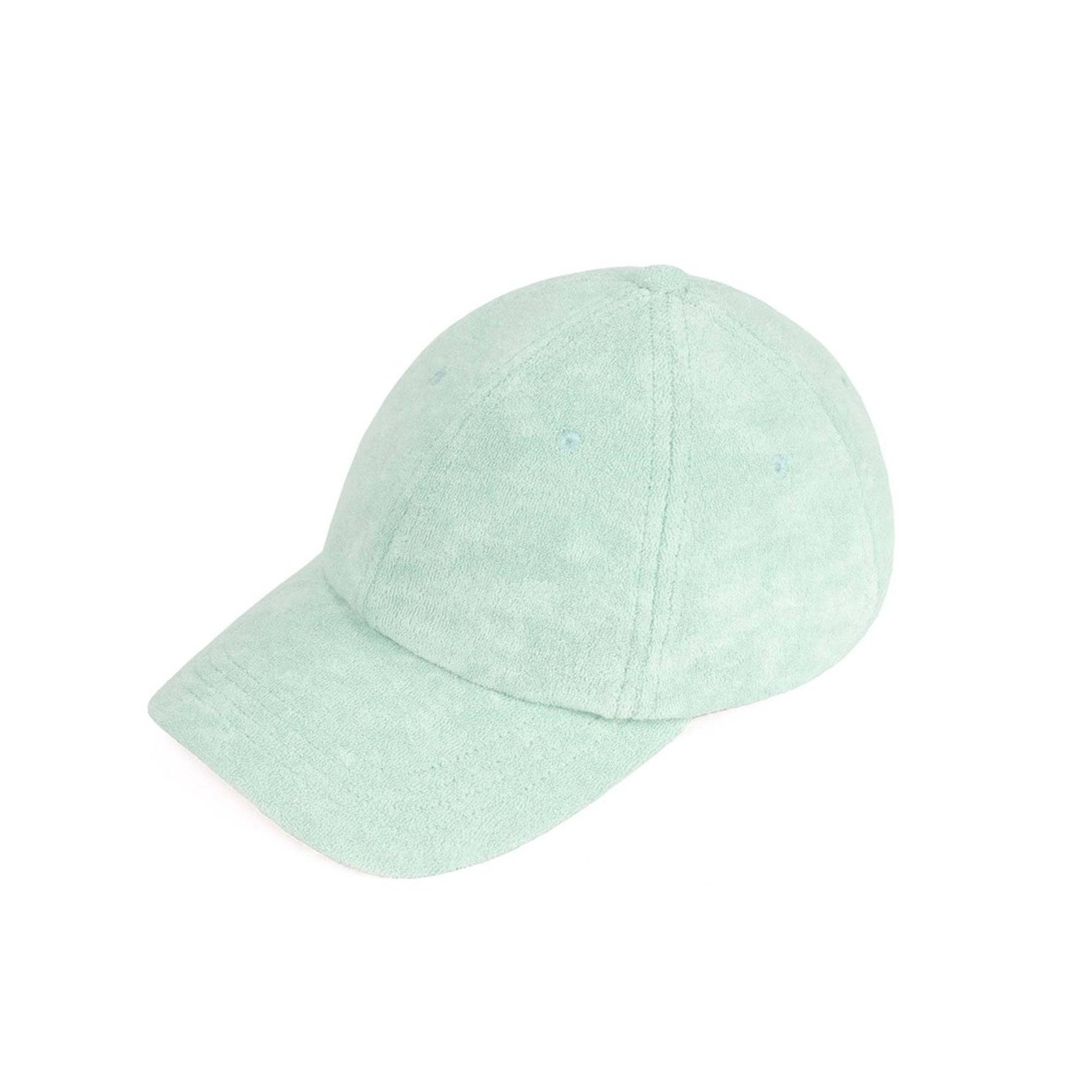 CC Terry Cloth Women Baseball Trucker Cap featuring a low ponytail opening, adjustable velcro back, and soft terry cloth material.