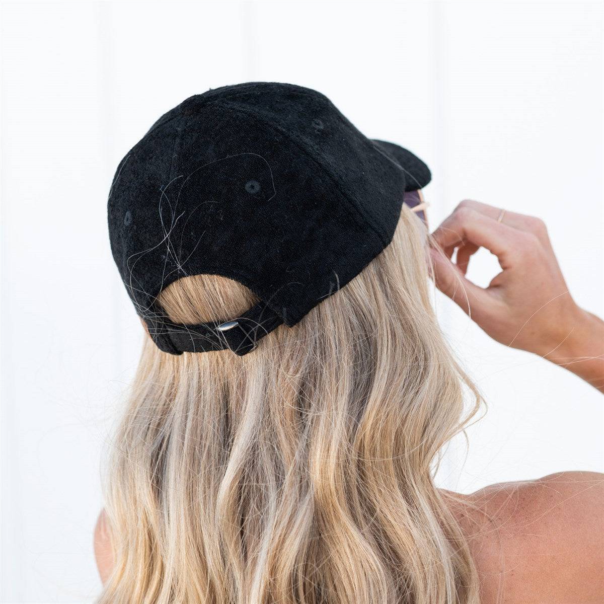 CC Terry Cloth Women Baseball Trucker Cap featuring a low ponytail opening, adjustable velcro back, and soft terry cloth material.