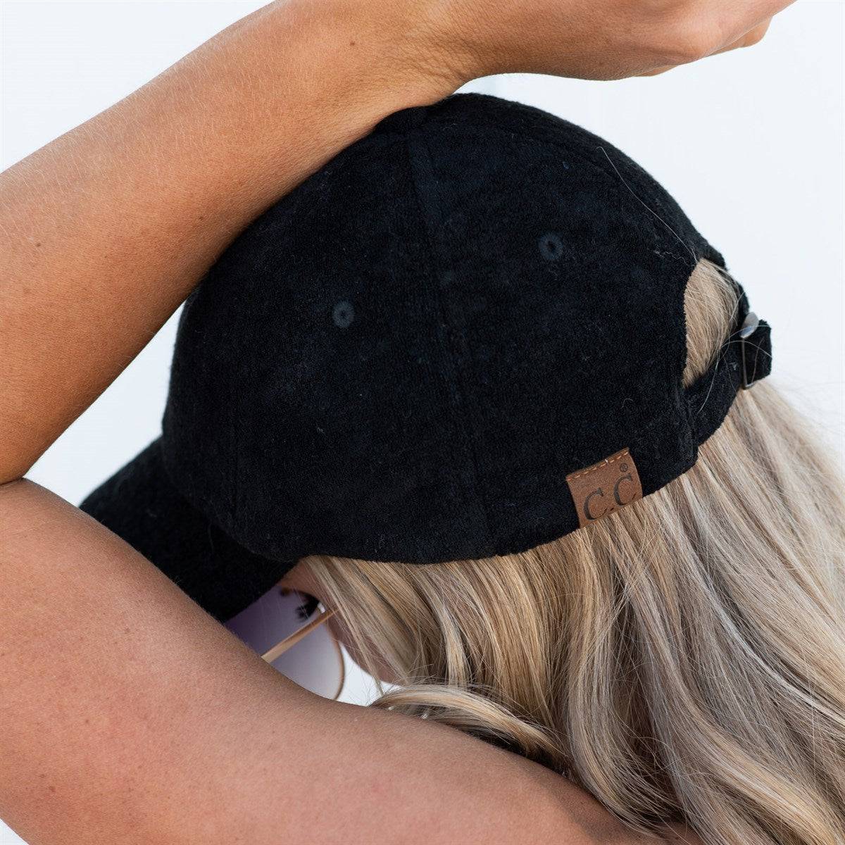 CC Terry Cloth Women Baseball Trucker Cap featuring a low ponytail opening, adjustable velcro back, and soft terry cloth material.