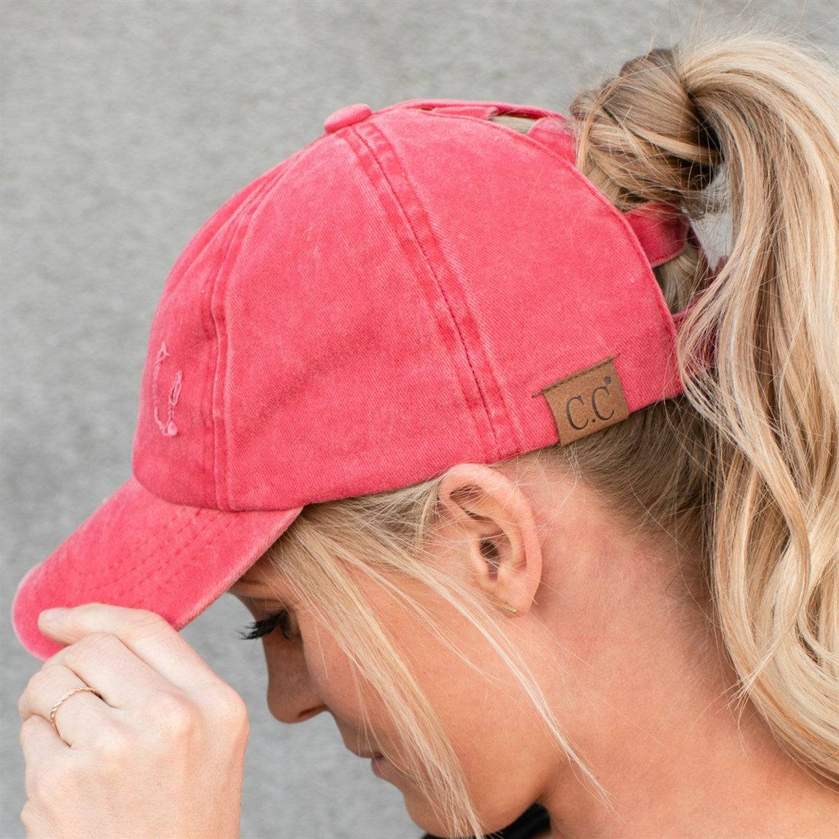 CC Three Level Pony Cap featuring adjustable velcro strap and three ponytail access levels, perfect for various hairstyles.