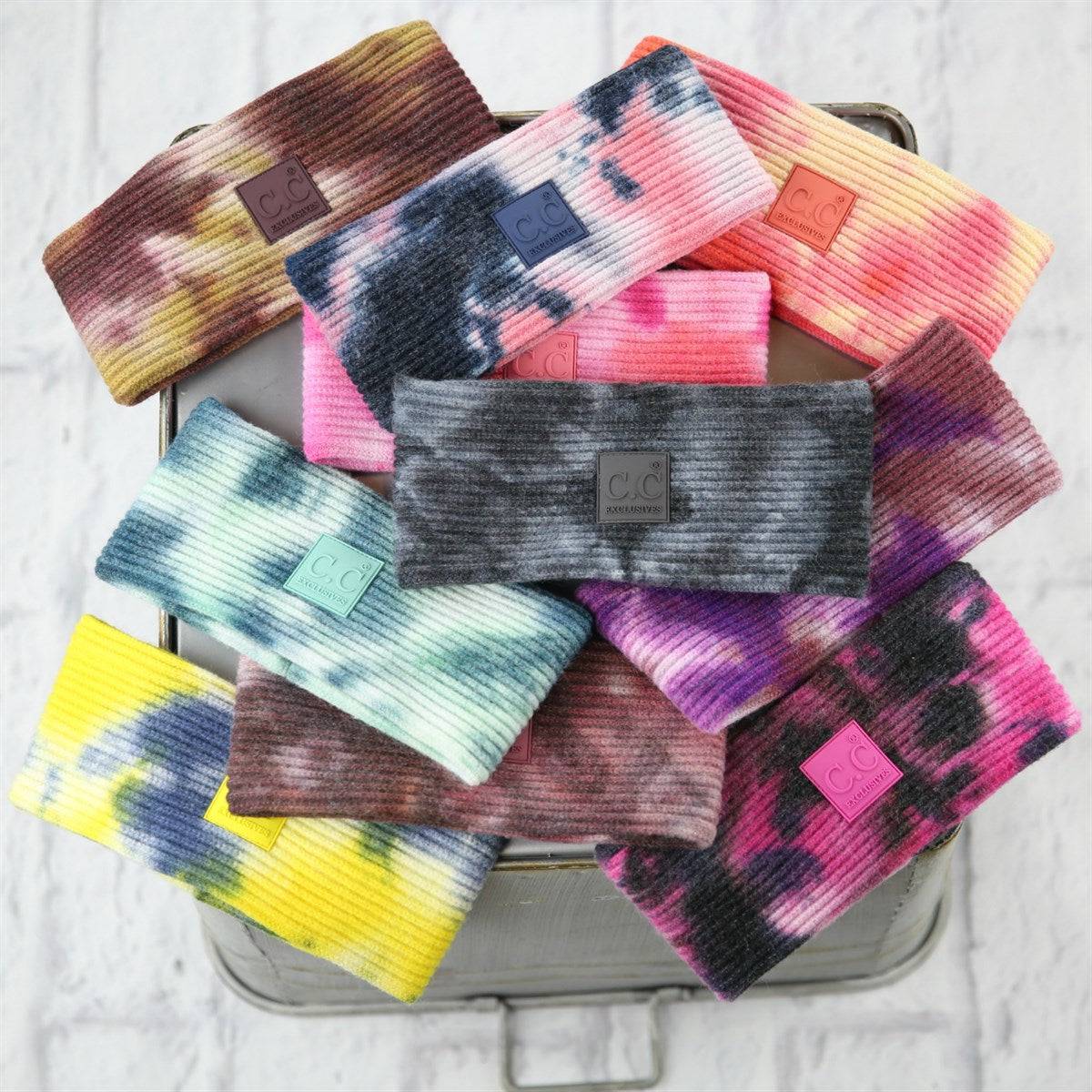 Colorful CC Tie Dye Head Wrap showcasing unique patterns and soft fabric, perfect for stylish ear coverage.