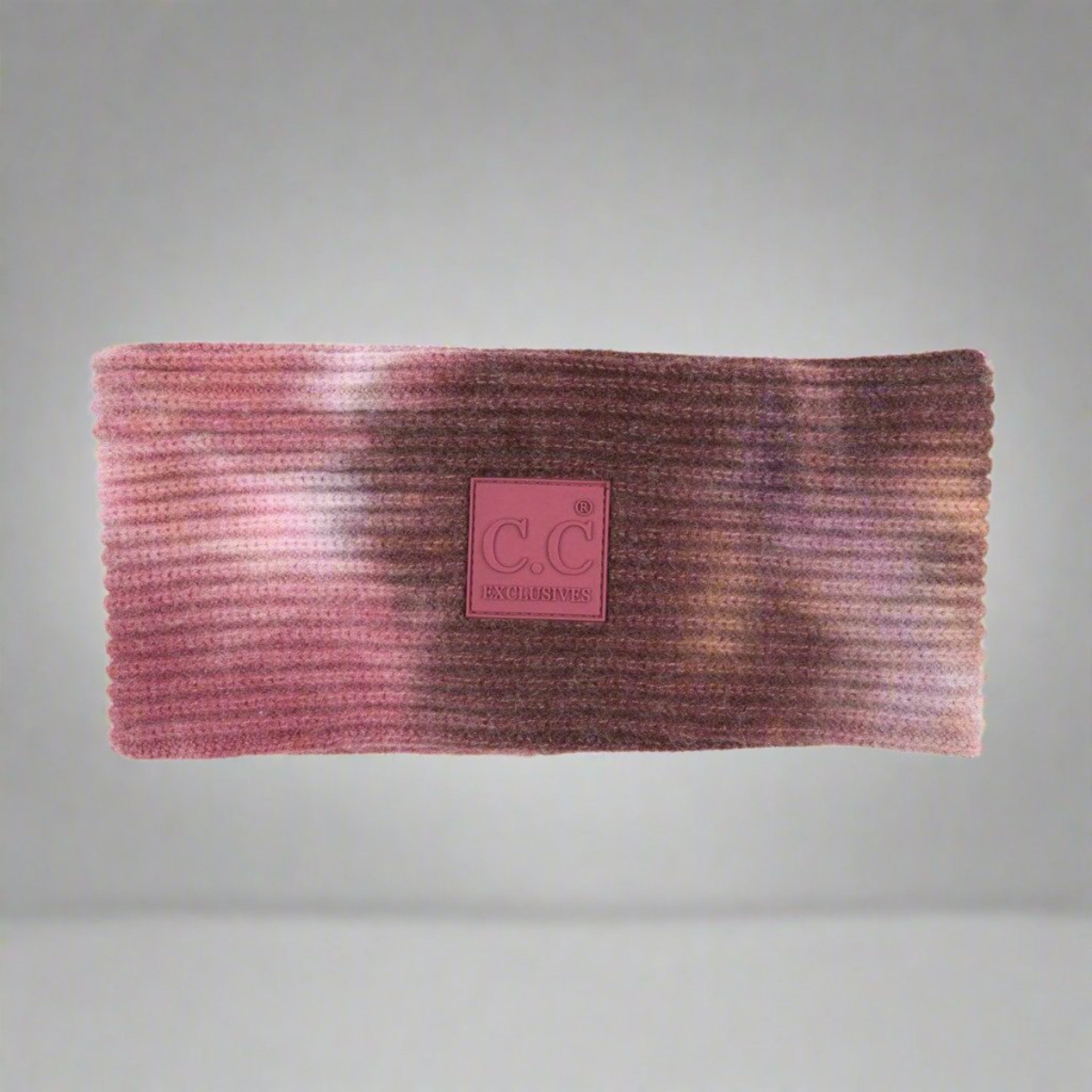 CC Tie Dye Headwrap featuring unique patterns and authentic C.C branding, designed for comfort and style.