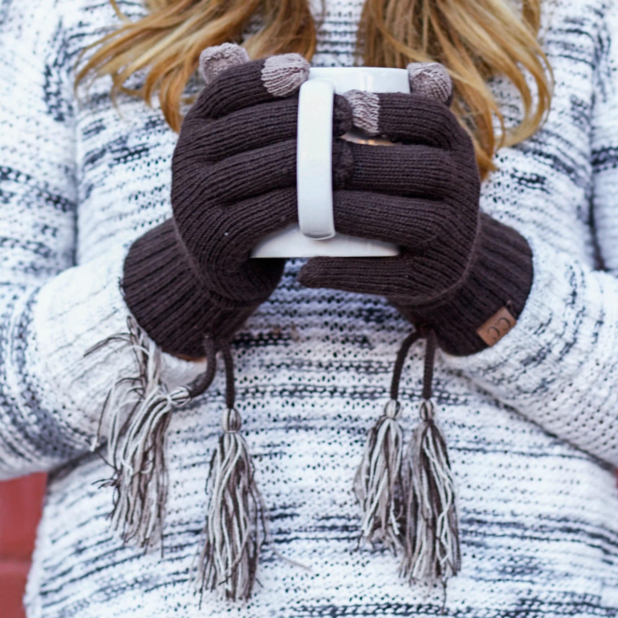 CC Touchscreen Gloves with removable cuff and pom, showcasing a stylish cable knit pattern in soft acrylic material.