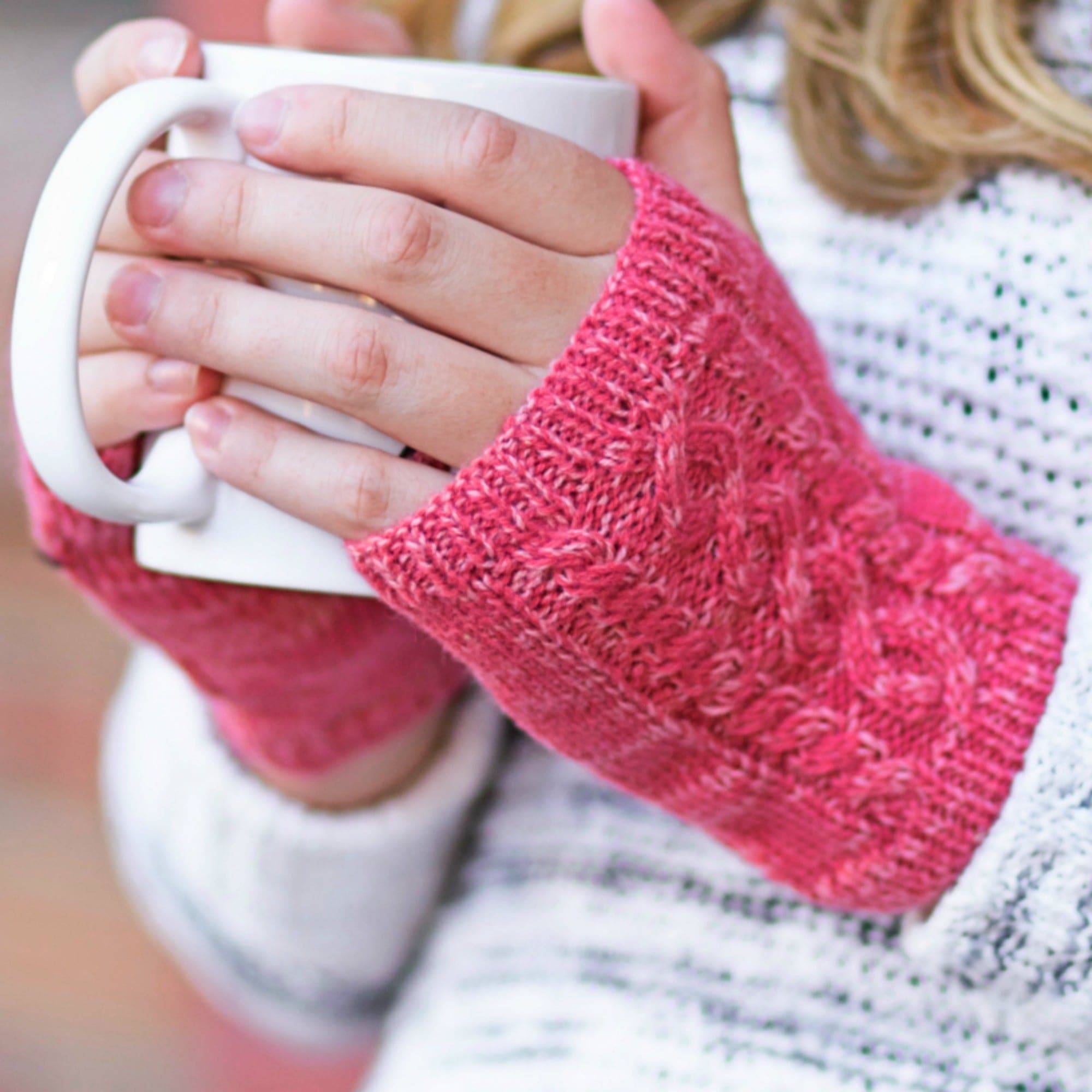 CC Touchscreen Gloves with removable cuff and pom, showcasing a stylish cable knit pattern in soft acrylic material.