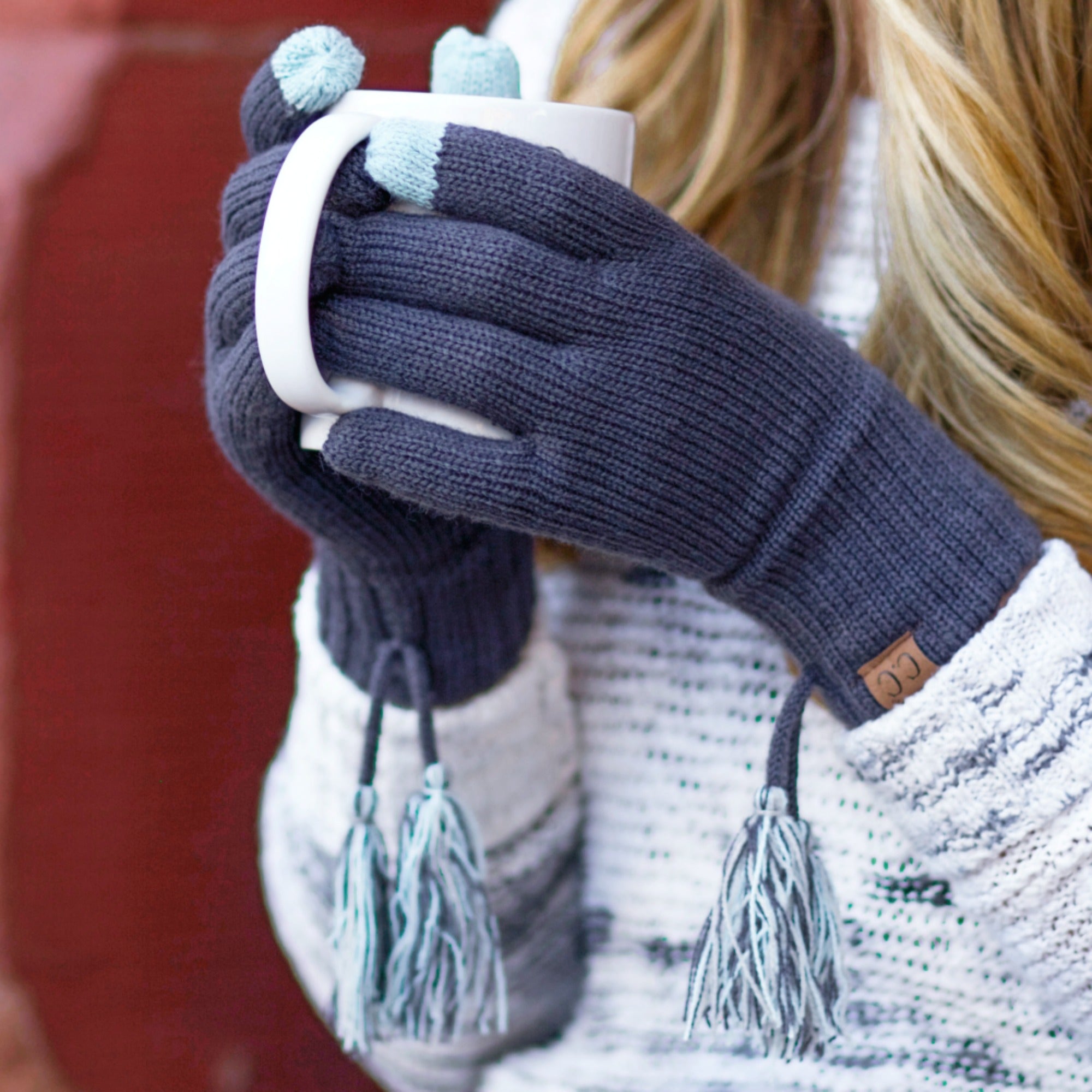 CC Touchscreen Gloves with removable cuff and pom, showcasing a stylish cable knit pattern in soft acrylic material.