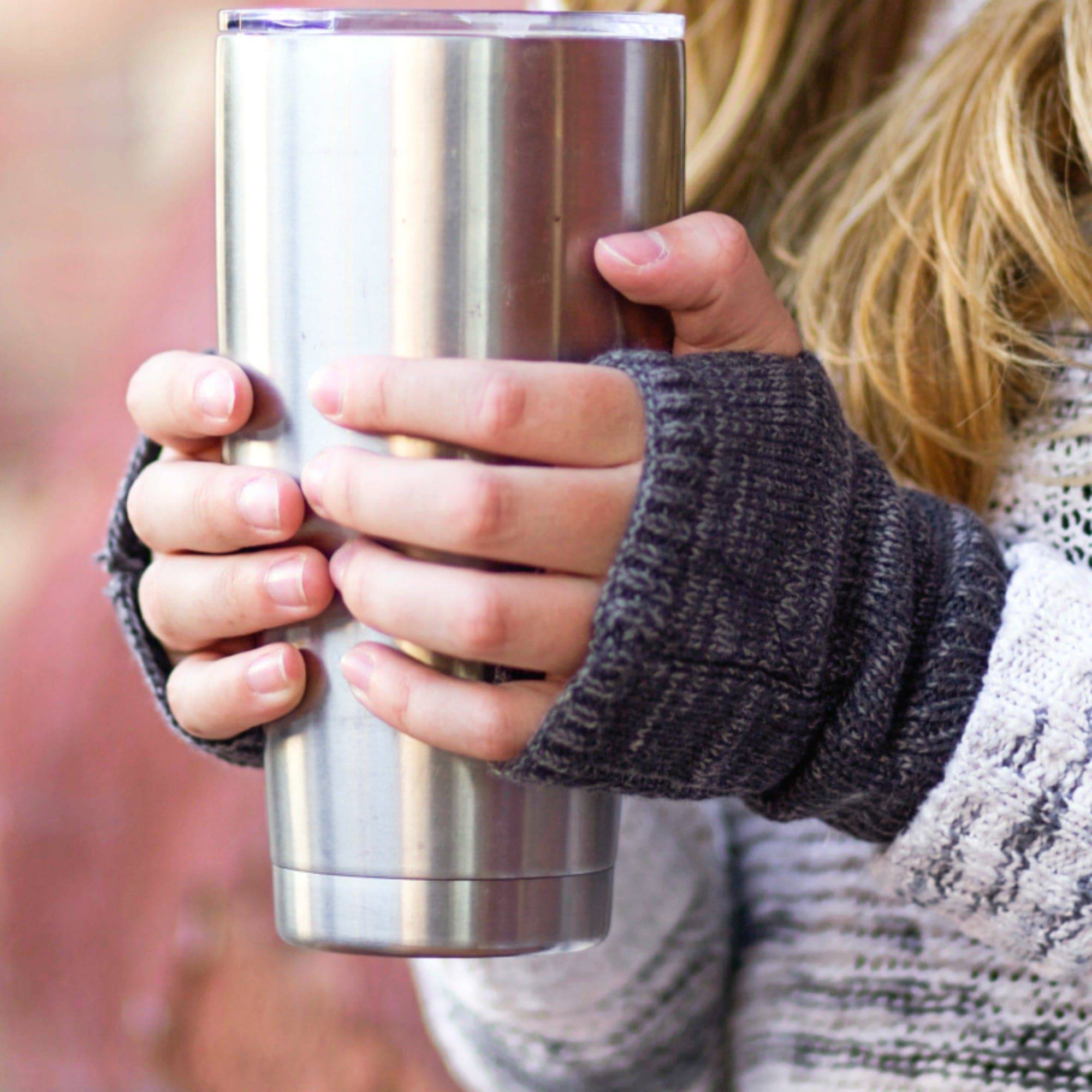 CC Touchscreen Gloves with removable cuff and pom, showcasing a stylish cable knit pattern in soft acrylic material.