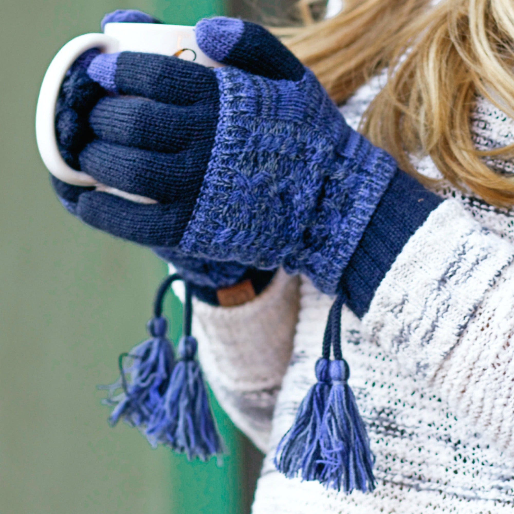 CC Touchscreen Gloves with removable cuff and pom, showcasing a stylish cable knit pattern in soft acrylic material.