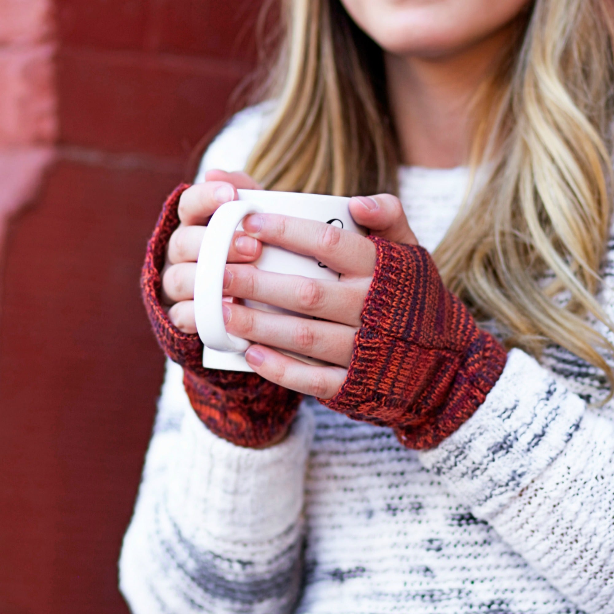 CC Touchscreen Gloves with removable cuff and pom, showcasing a stylish cable knit pattern in soft acrylic material.